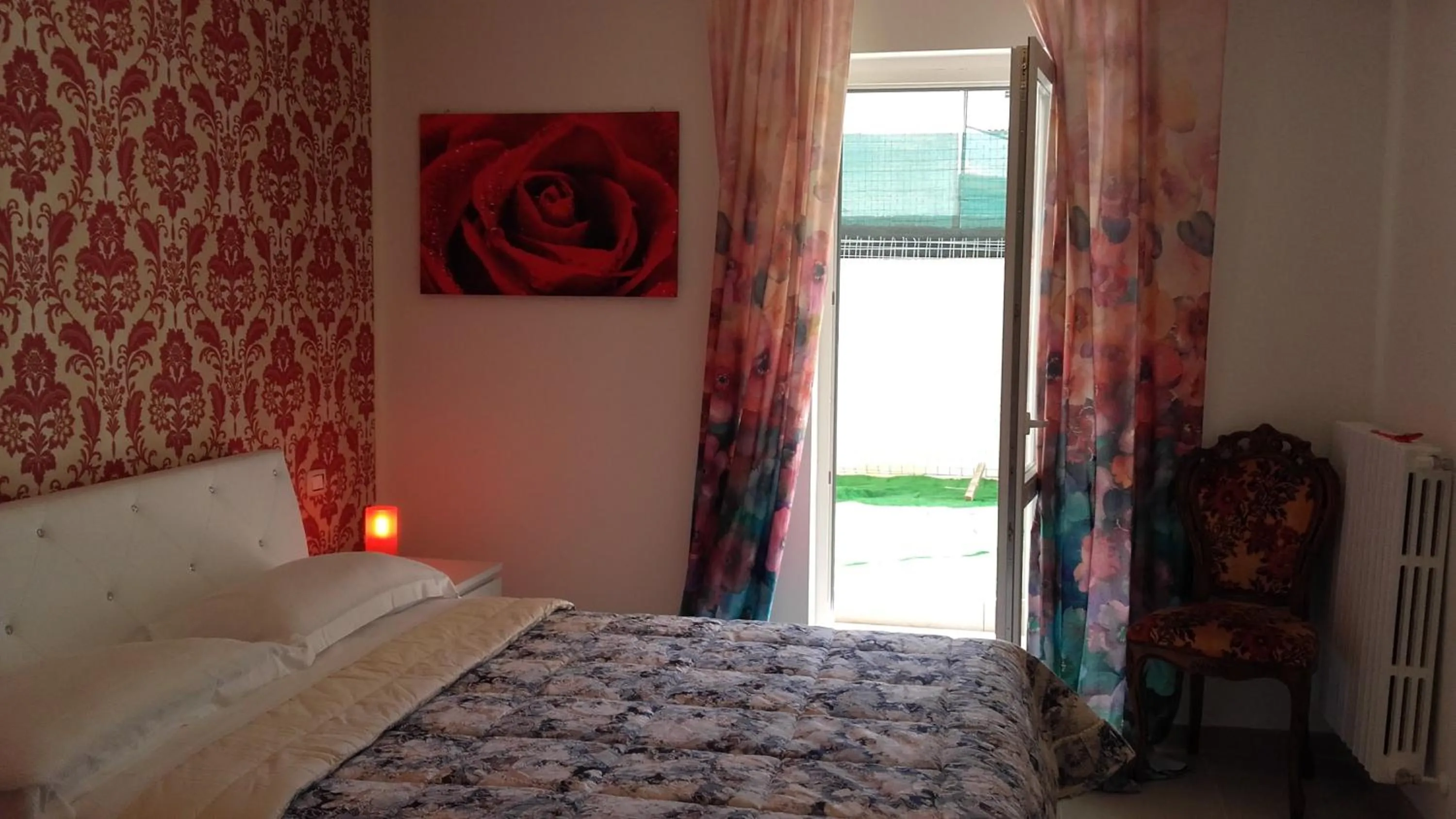 Bed in Le Tre Rose Bed & Breakfast