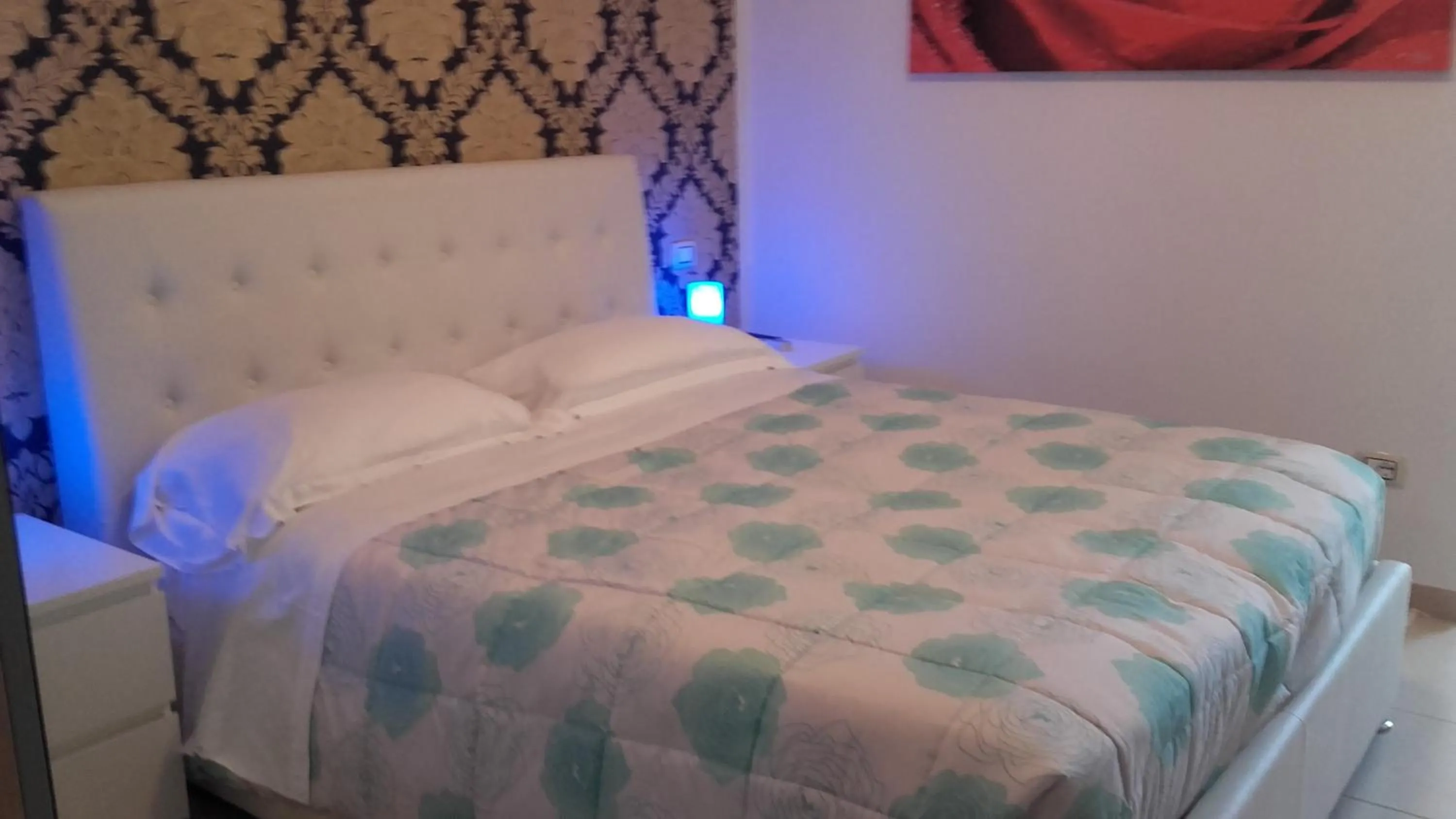 Bed in Le Tre Rose Bed & Breakfast