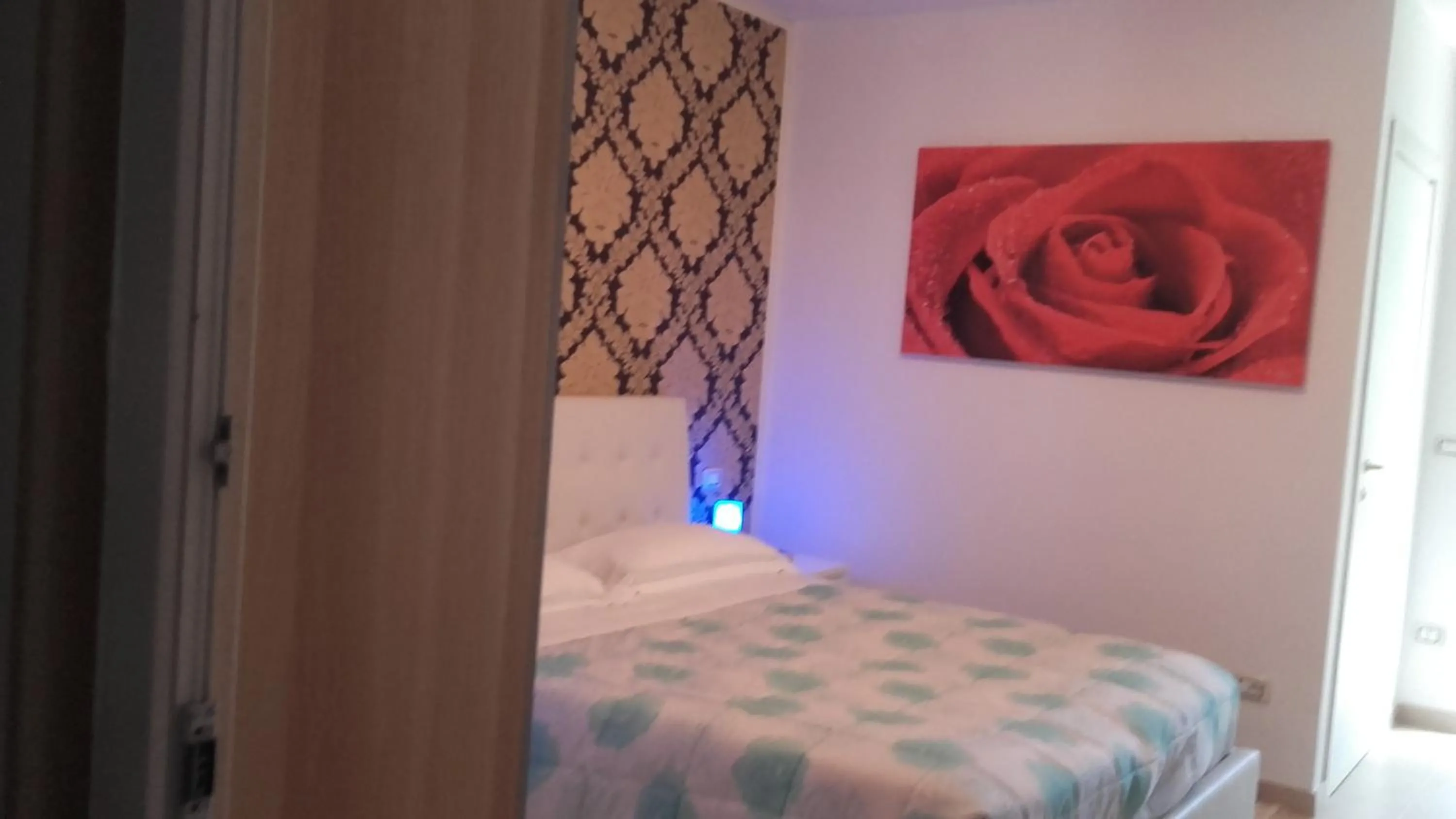 Bed in Le Tre Rose Bed & Breakfast