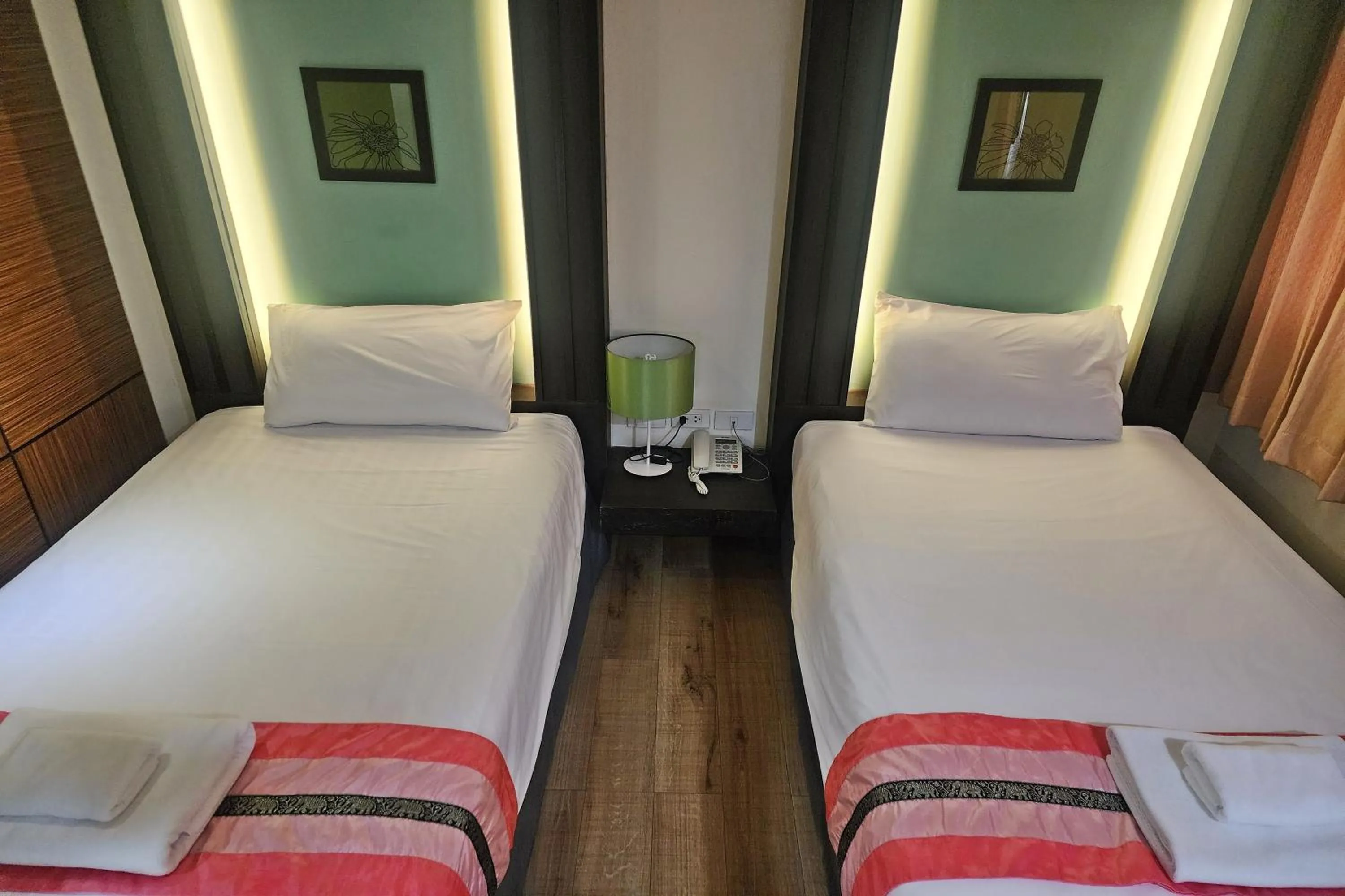 Bed in Suan Sunandha Palace Hotel