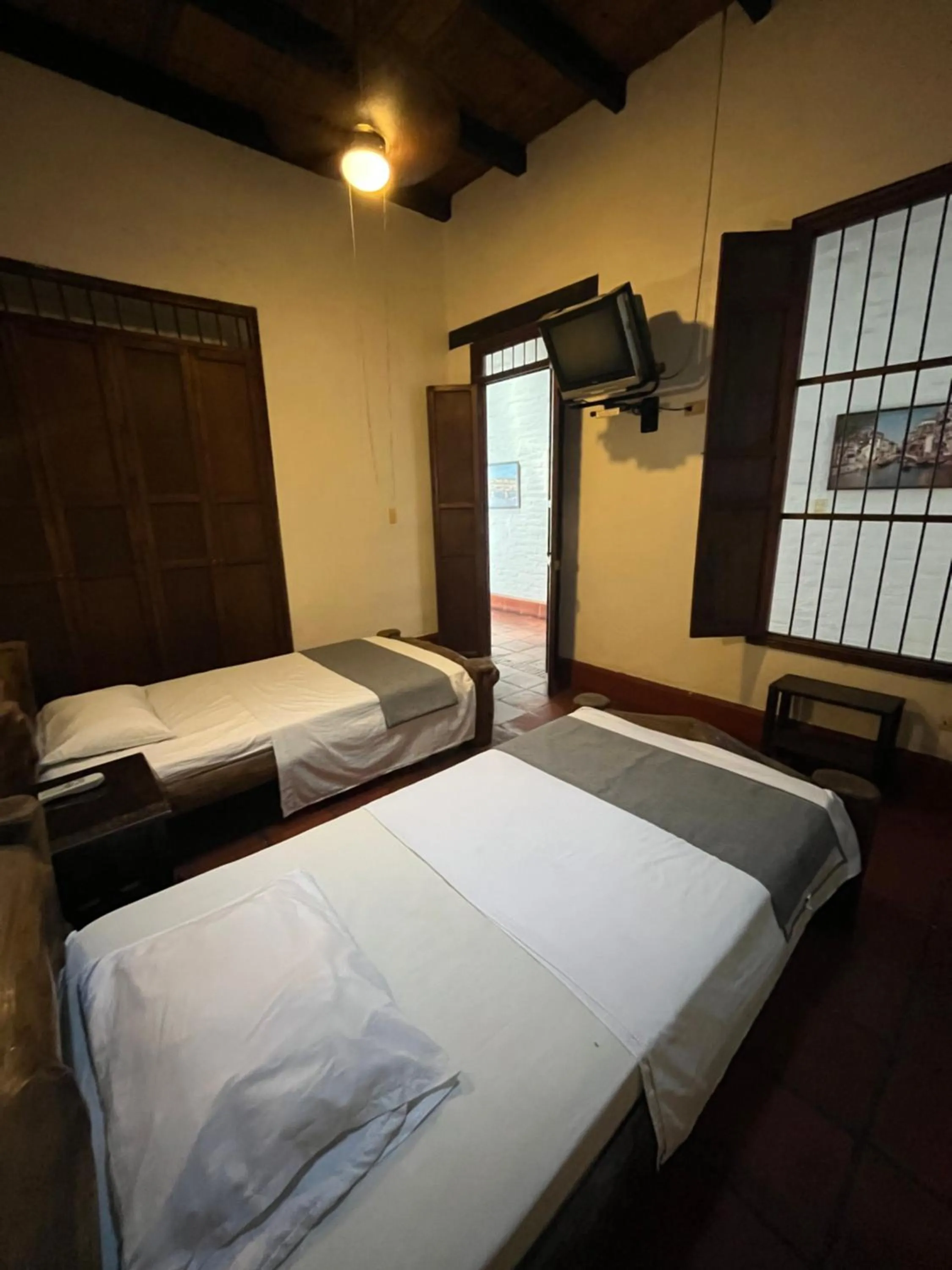 Bed in Hotel Colonial Palmira