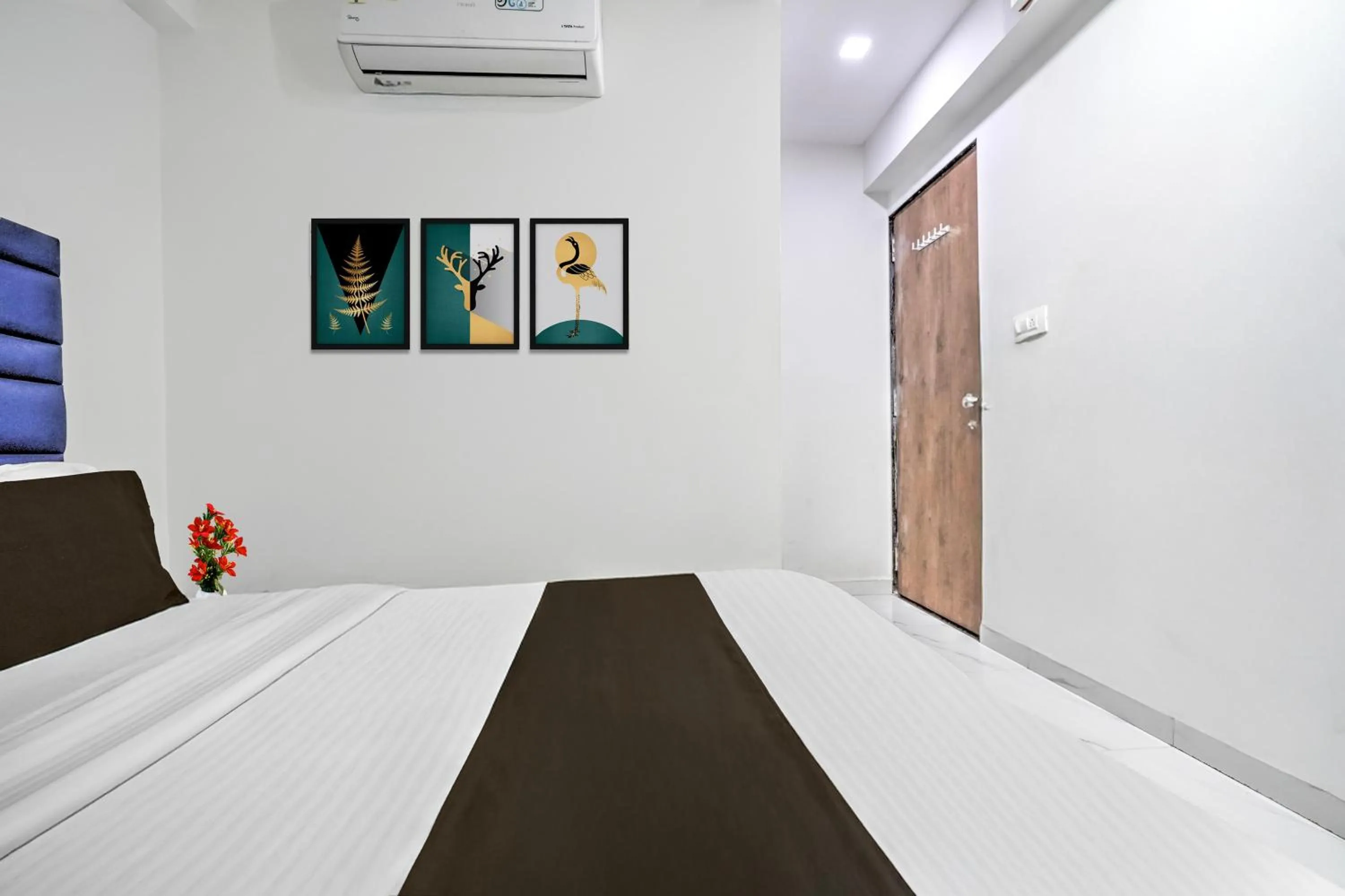 Bedroom in Hotel O Sneh Rashmi Botanical Garden Surat Formerly Stadium Plaza