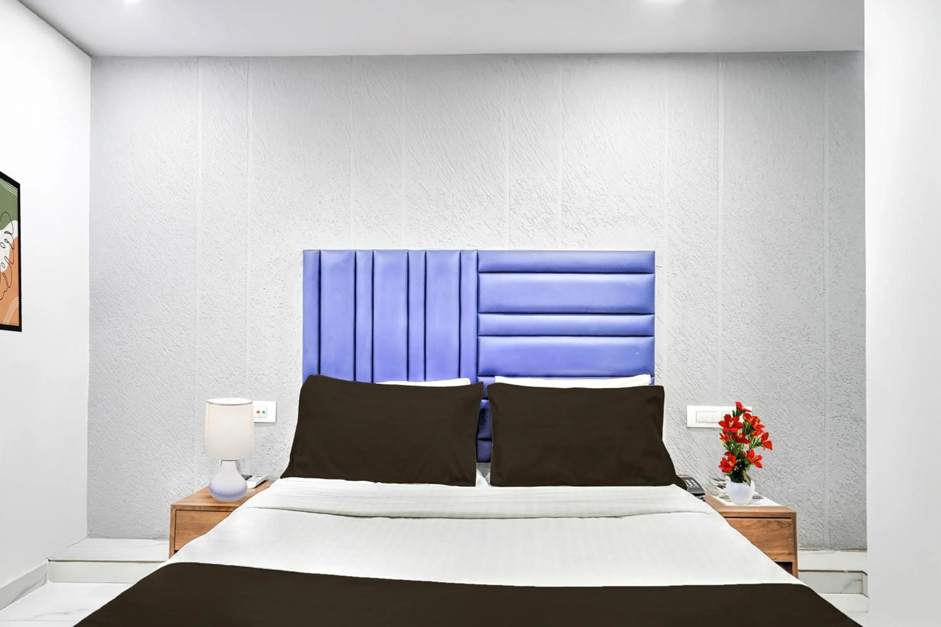 Bedroom in Hotel O Sneh Rashmi Botanical Garden Surat Formerly Stadium Plaza