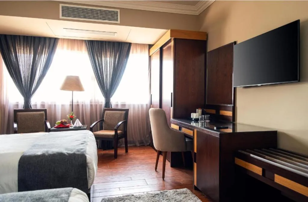 Seating area, Bed in New Marwa Palace