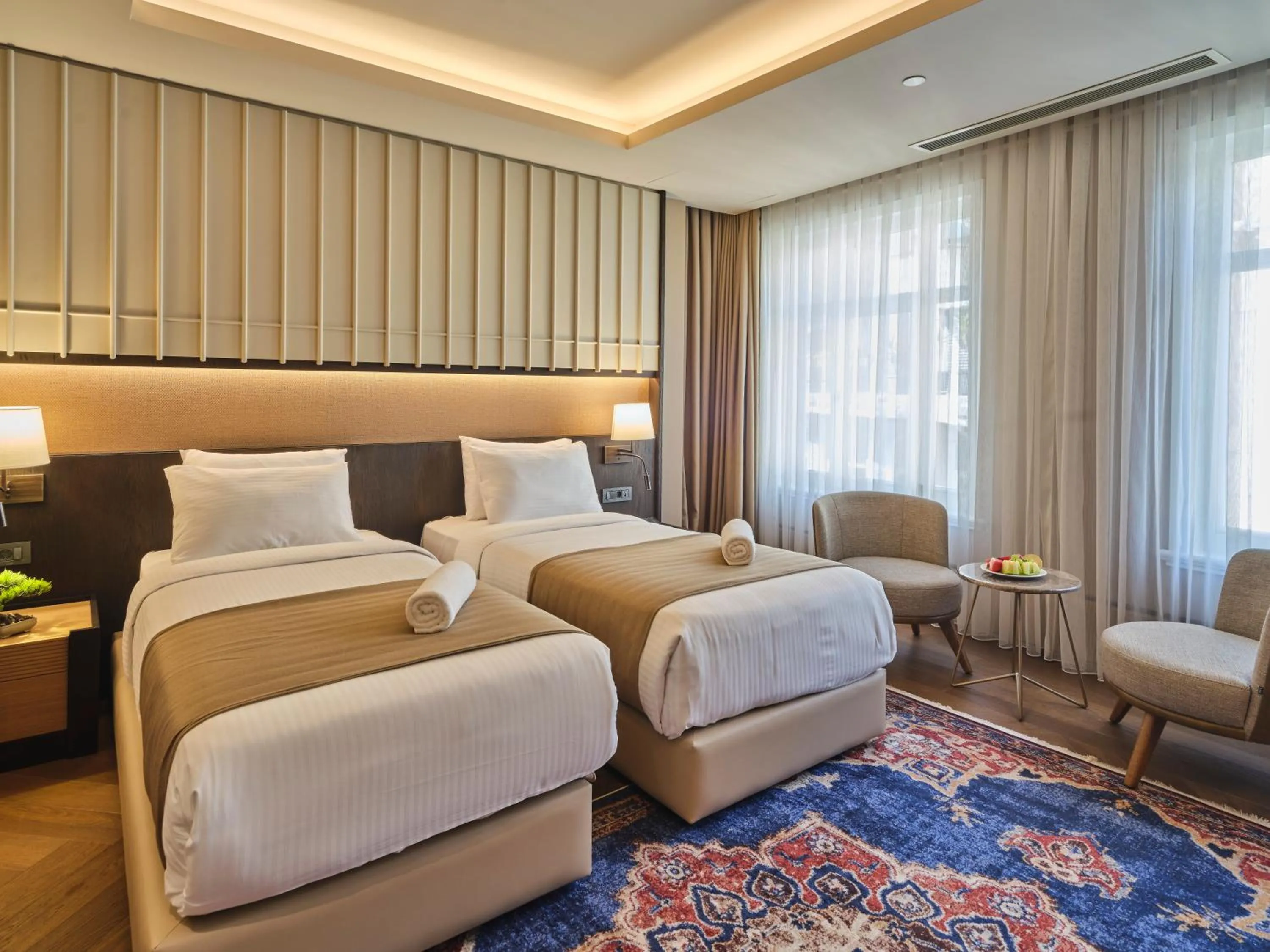 Bed in Four-G Hotel Premium