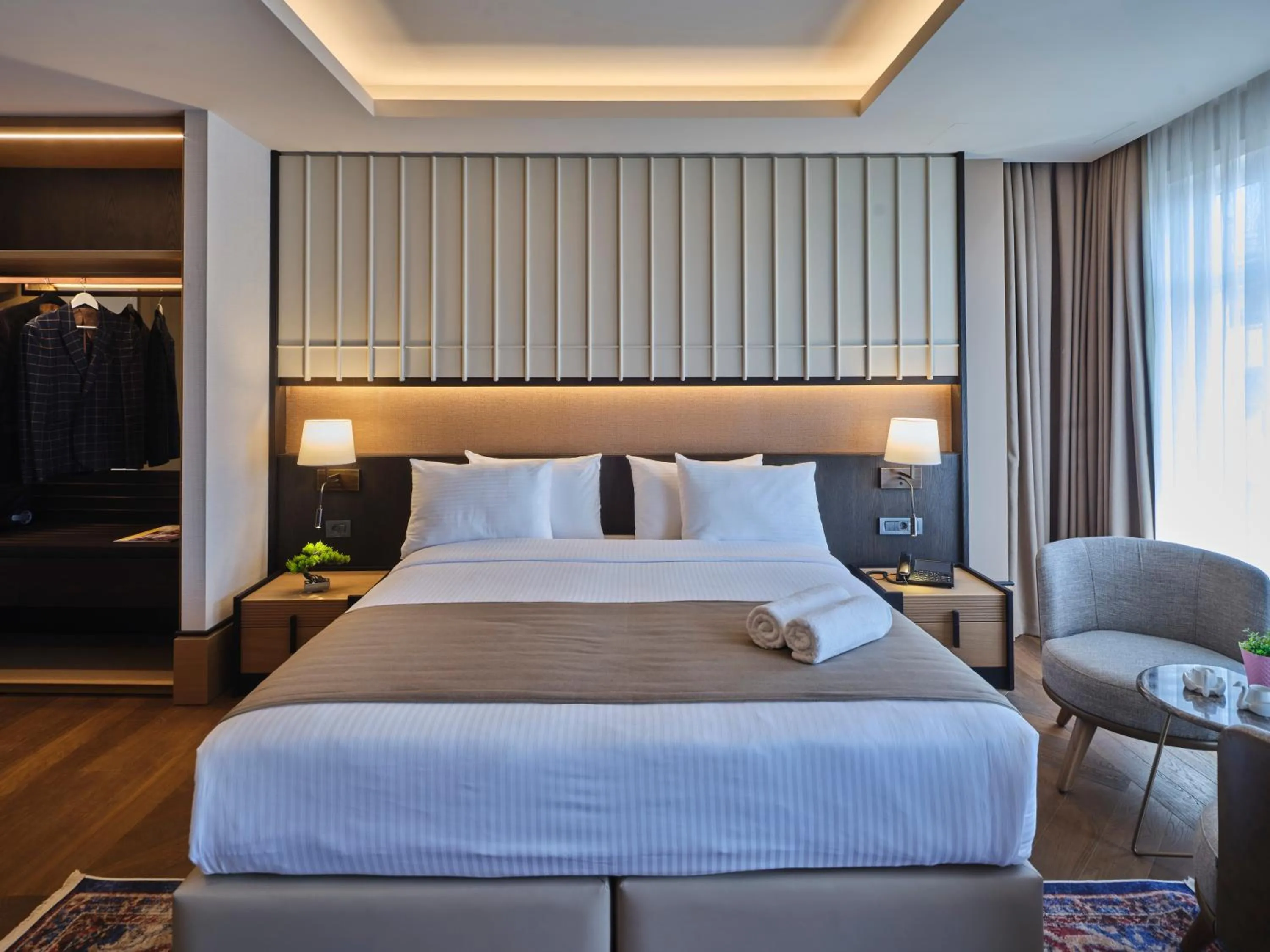 Bed in Four-G Hotel Premium