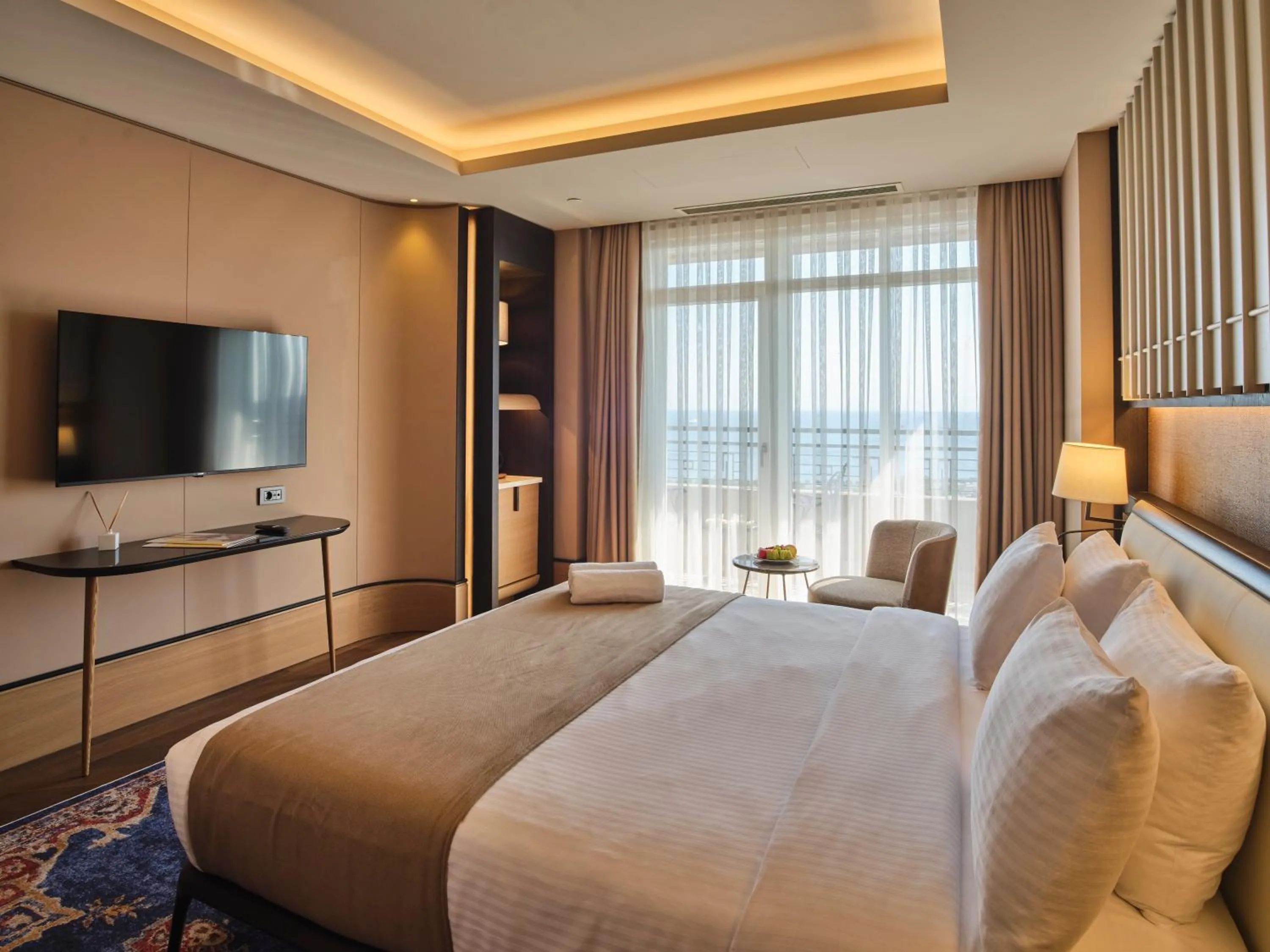 Bed in Four-G Hotel Premium