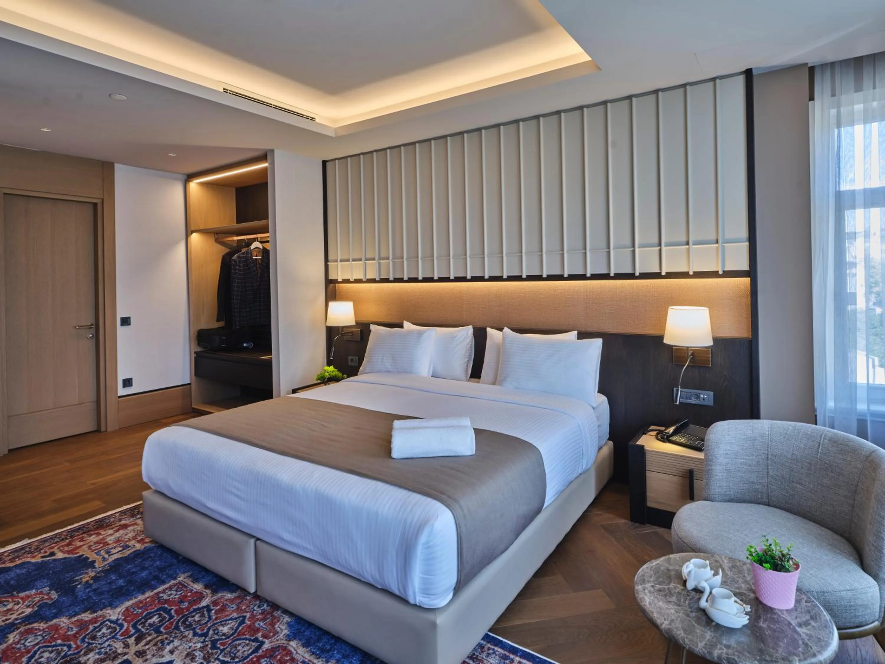 Bedroom, Bed in Four-G Hotel Premium