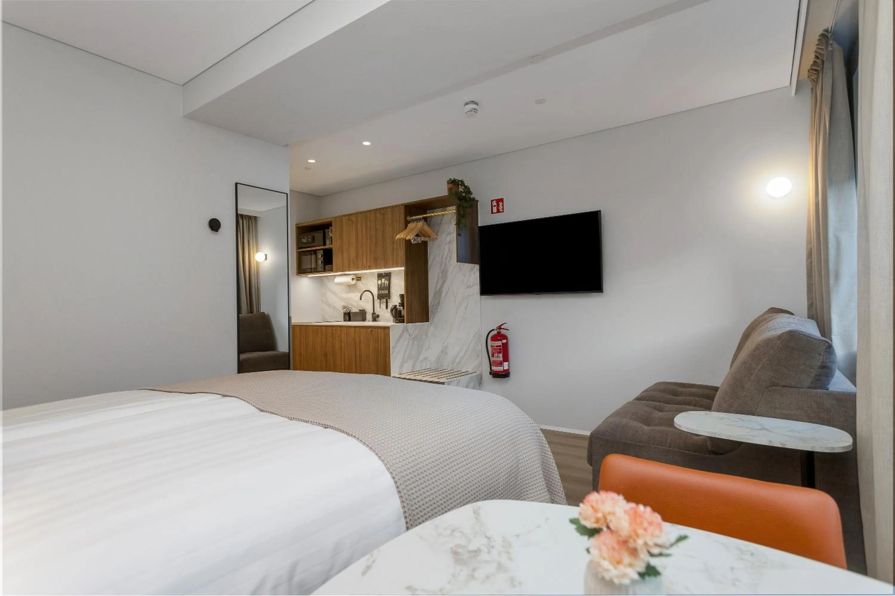 Bed in Candlewood Suites Reykjavik by IHG