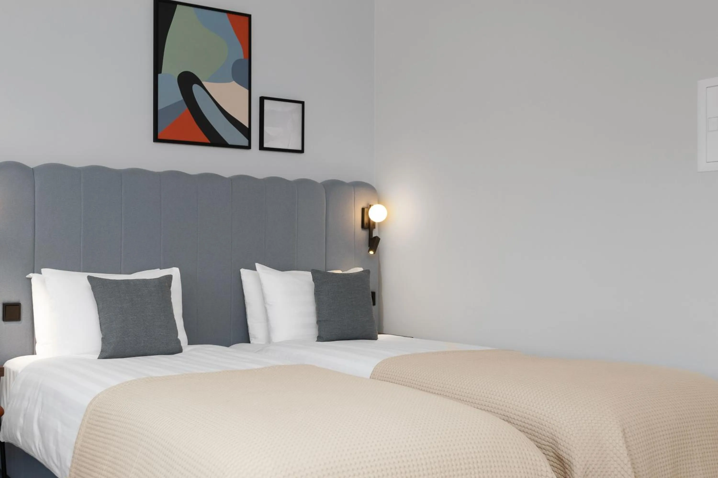 Bed in Candlewood Suites Reykjavik by IHG