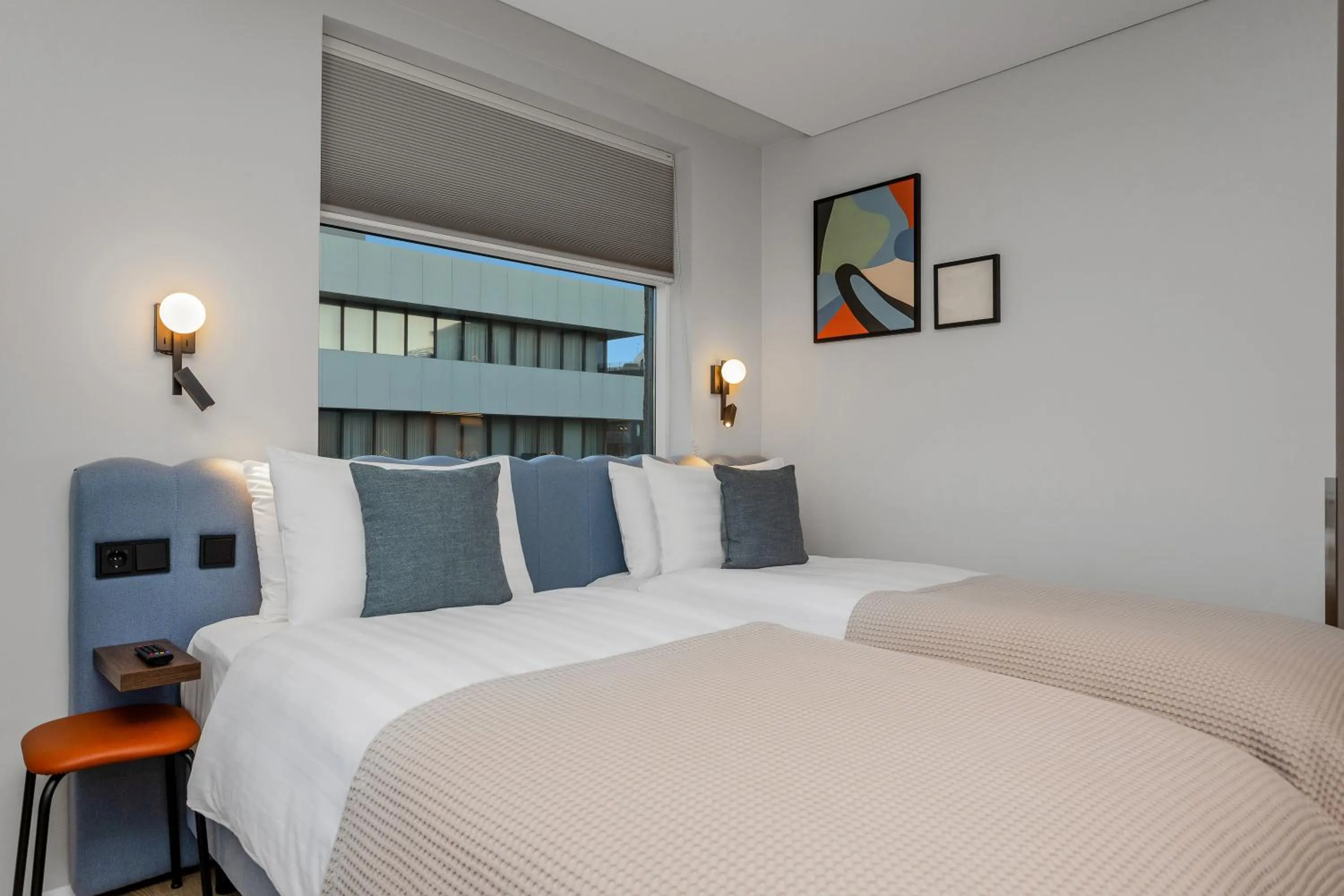 Bed in Candlewood Suites Reykjavik by IHG