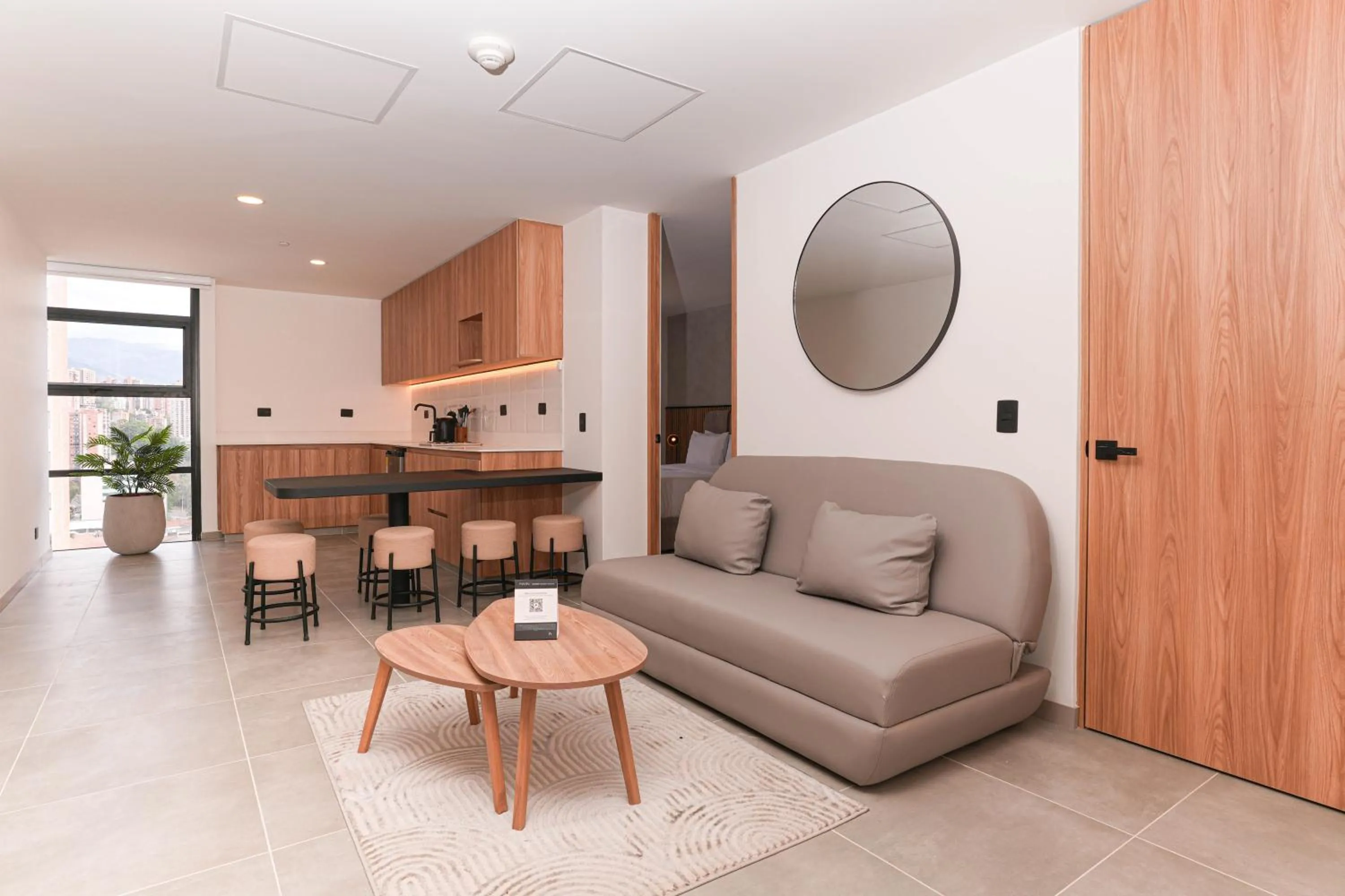 Living room in Metropolitan Living Medellín by HOUSY