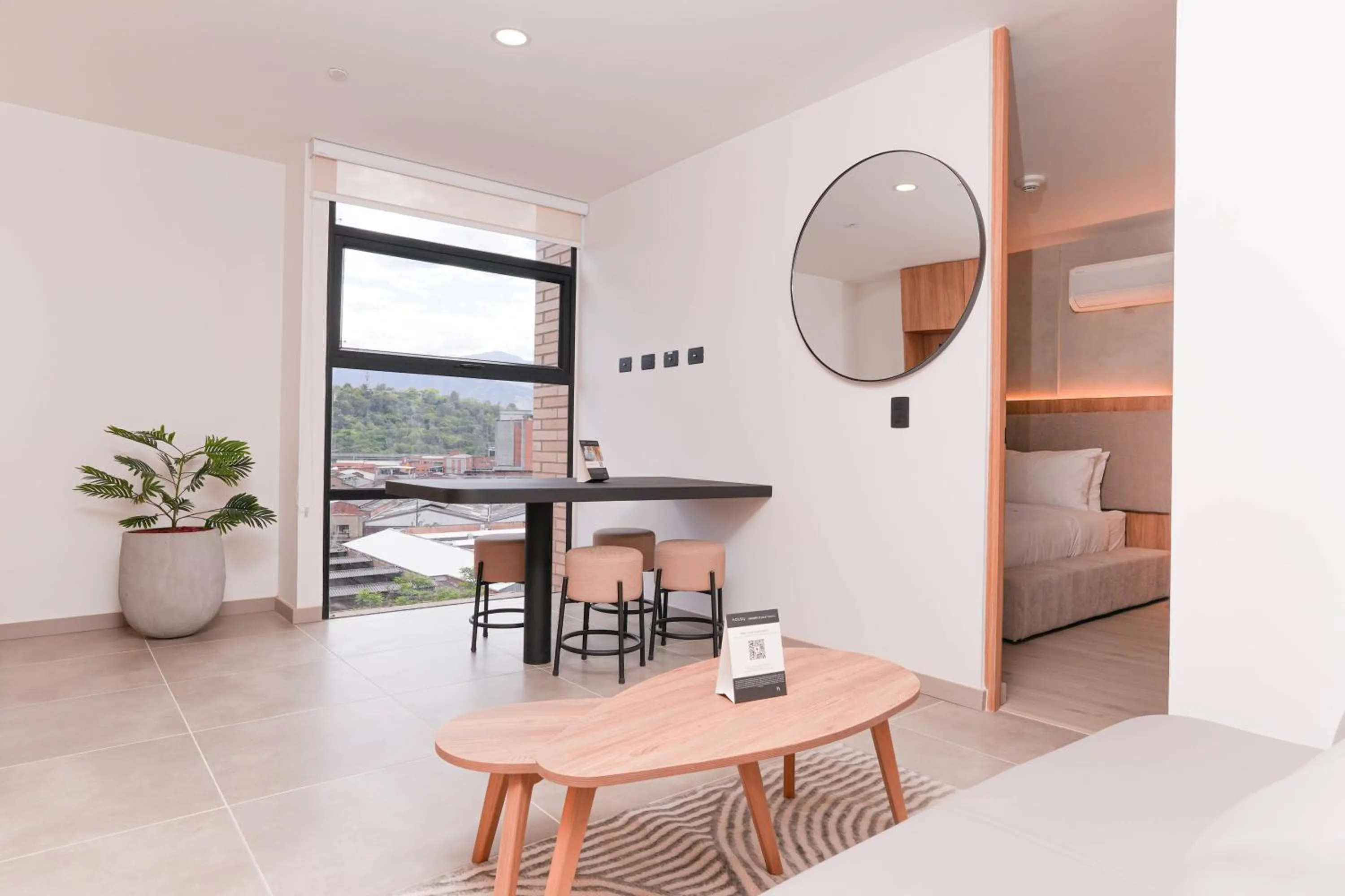 Living room in Metropolitan Living Medellín by HOUSY