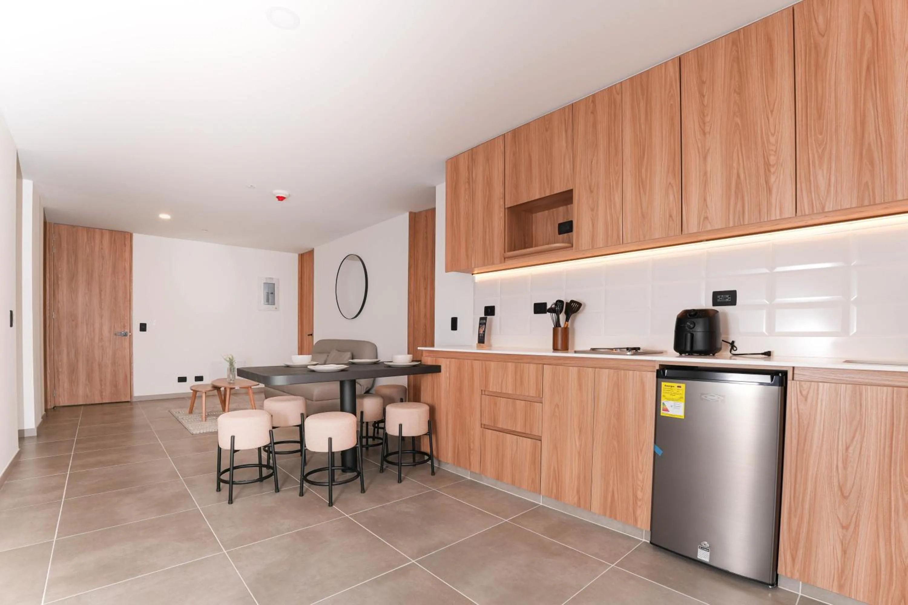 Kitchen or kitchenette in Metropolitan Living Medellín by HOUSY