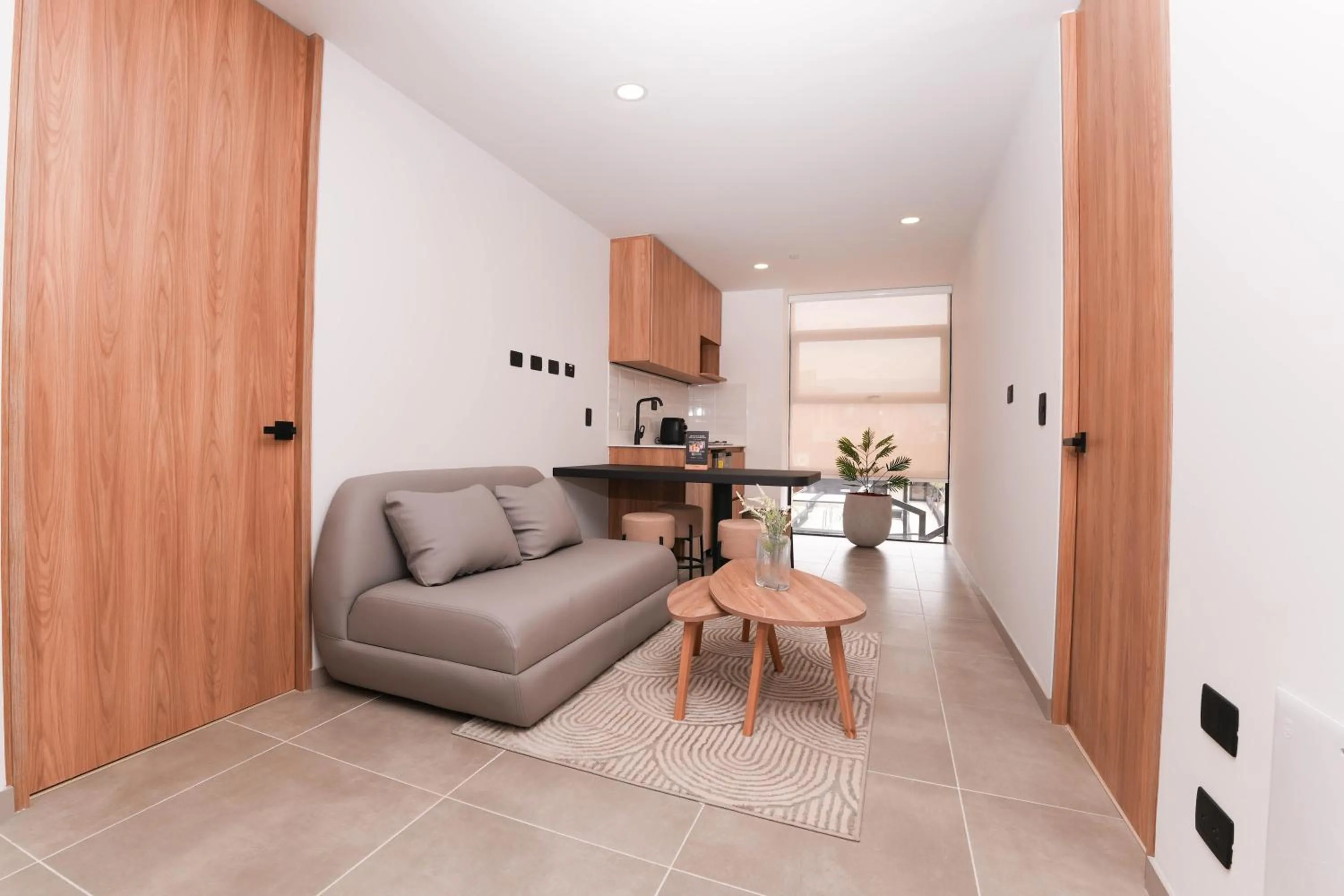 Kitchen or kitchenette in Metropolitan Living Medellín by HOUSY