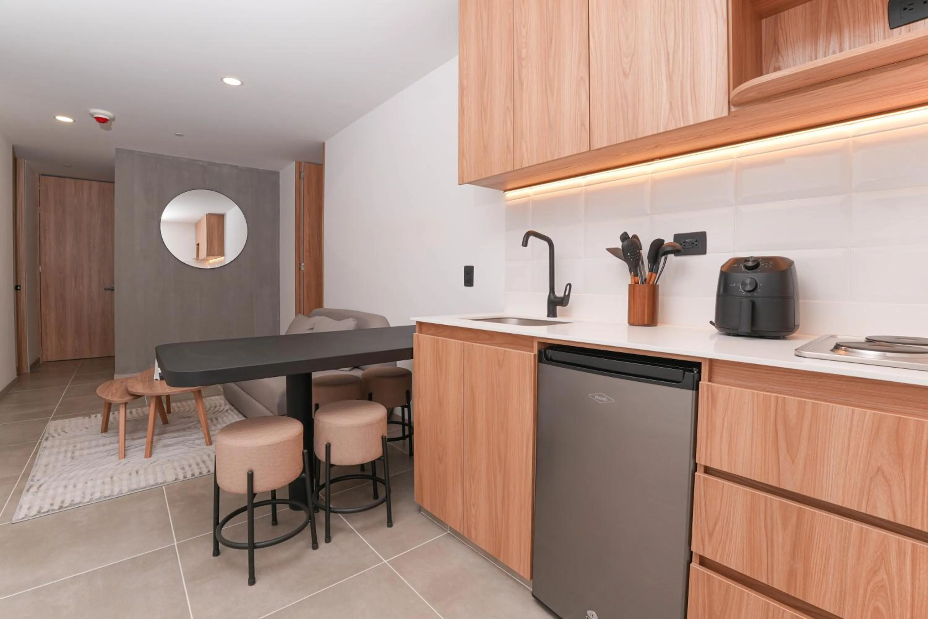 Kitchen or kitchenette in Metropolitan Living Medellín by HOUSY