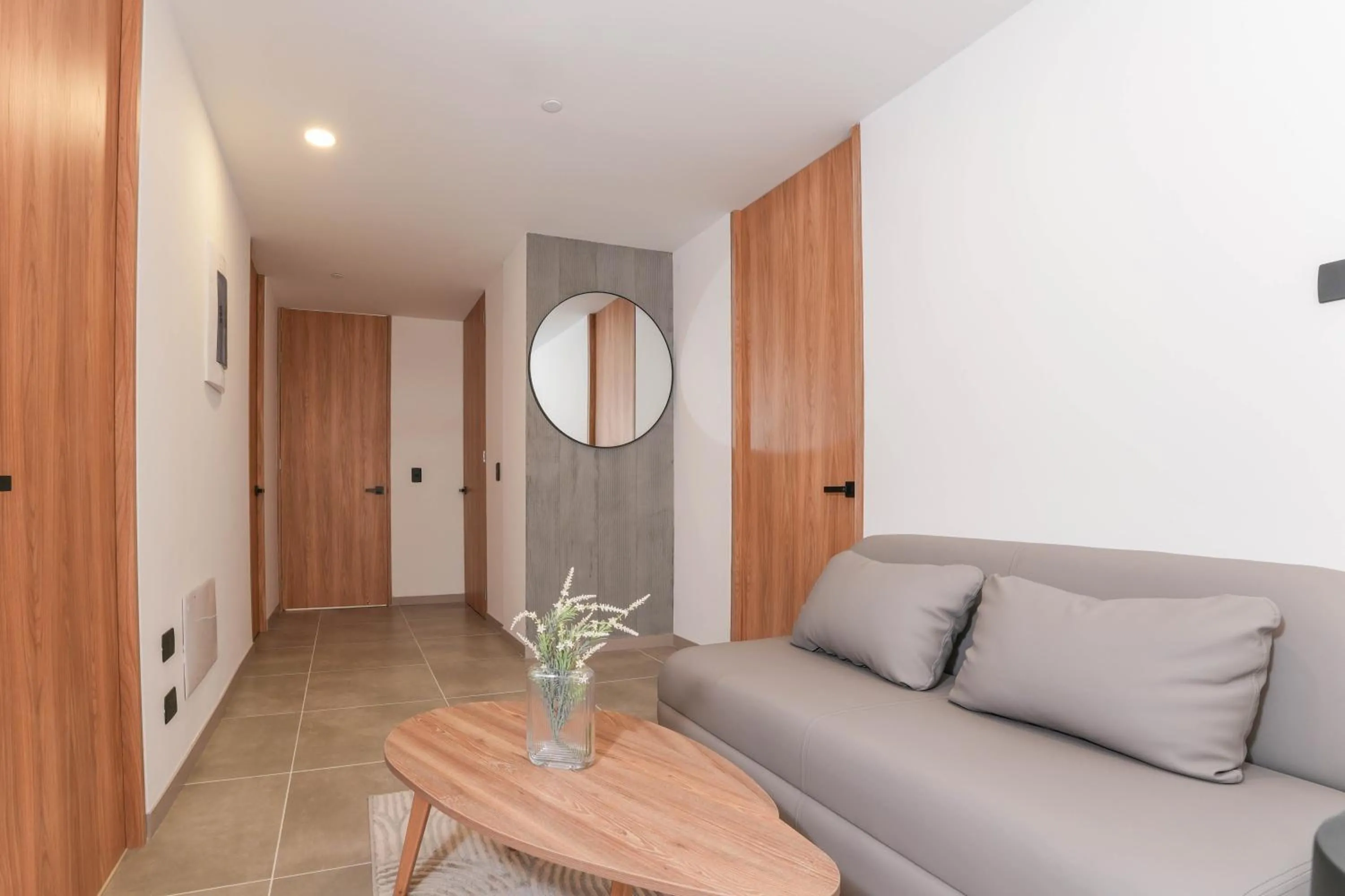 Living room in Metropolitan Living Medellín by HOUSY