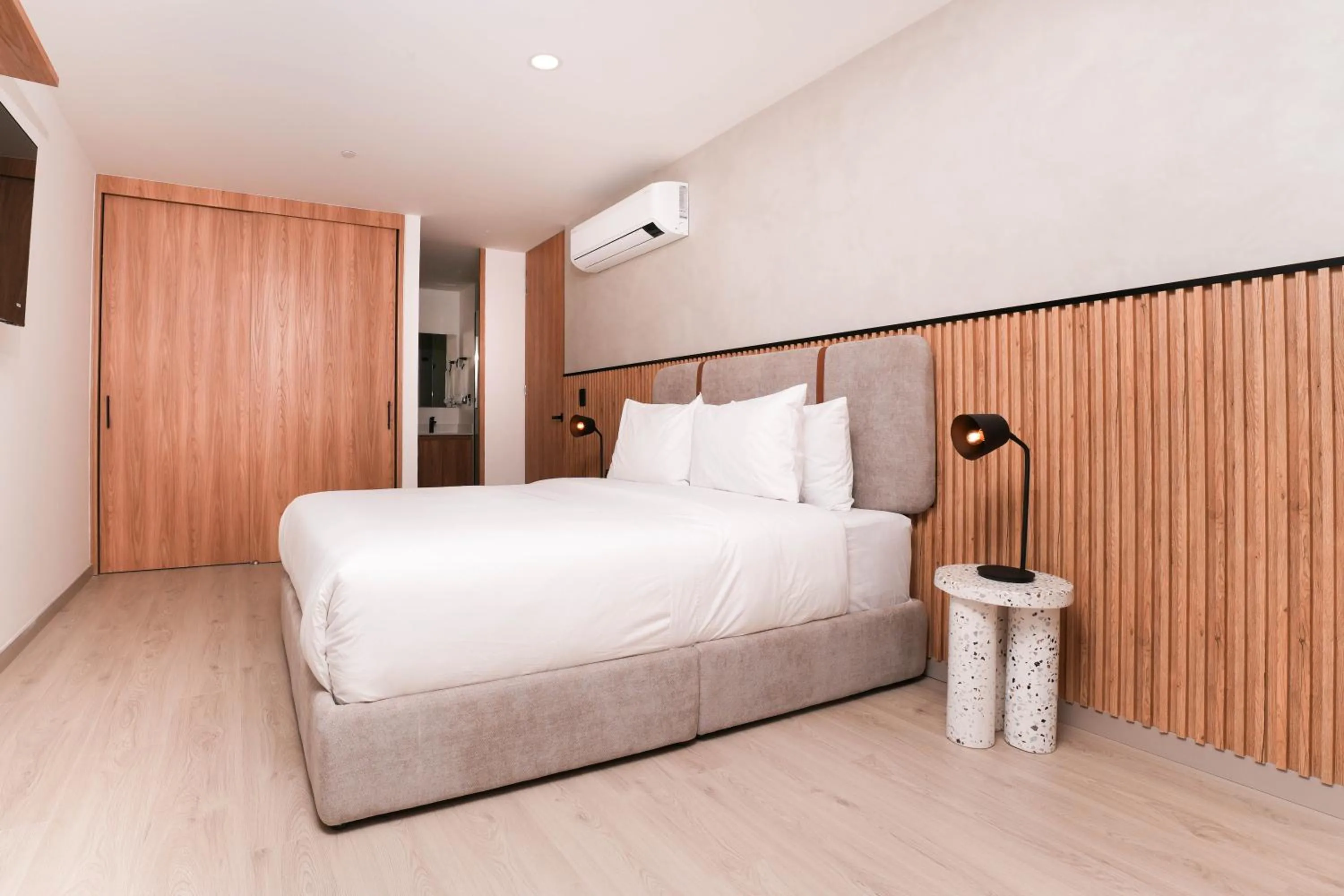Bed in Metropolitan Living Medellín by HOUSY