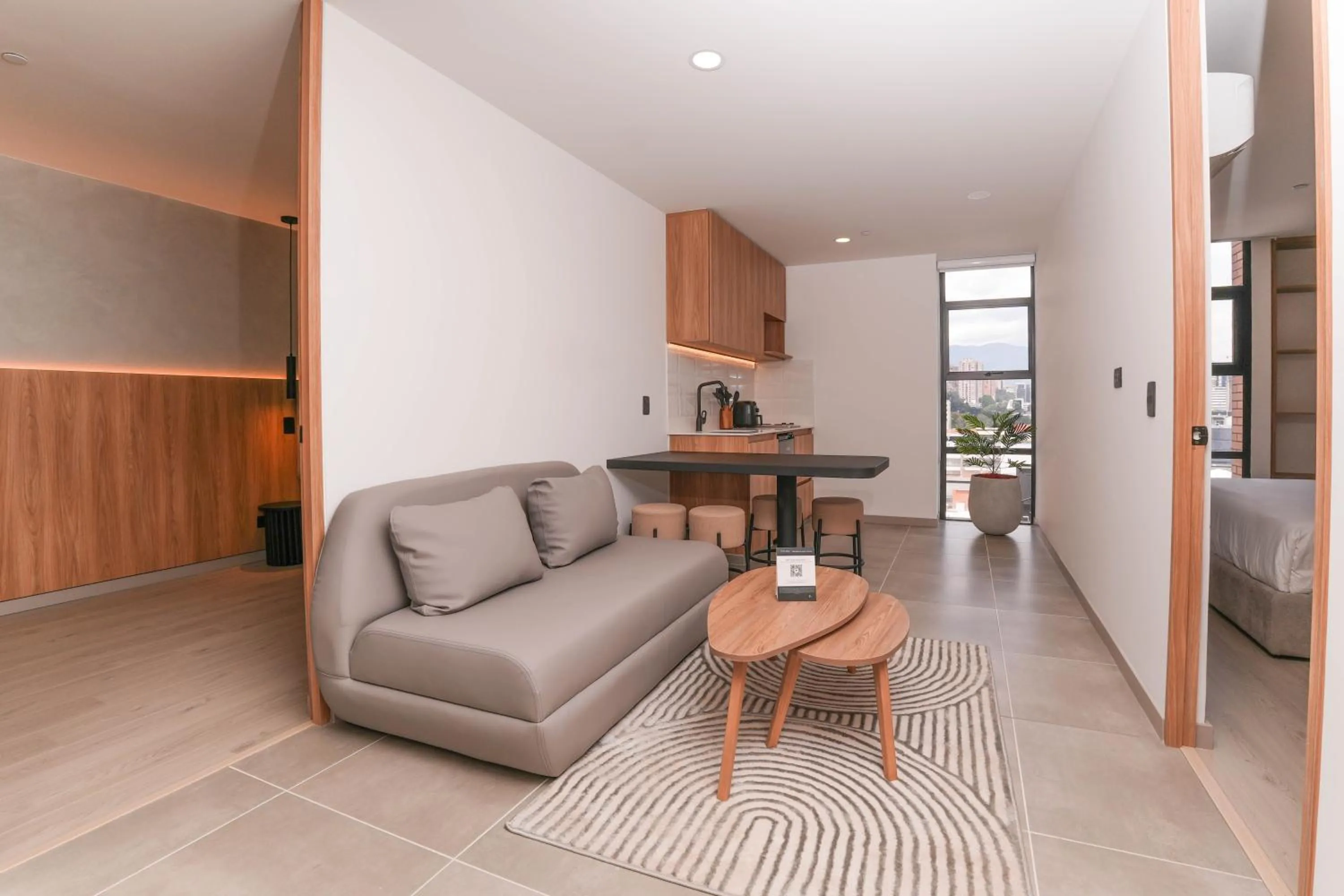 Living room in Metropolitan Living Medellín by HOUSY