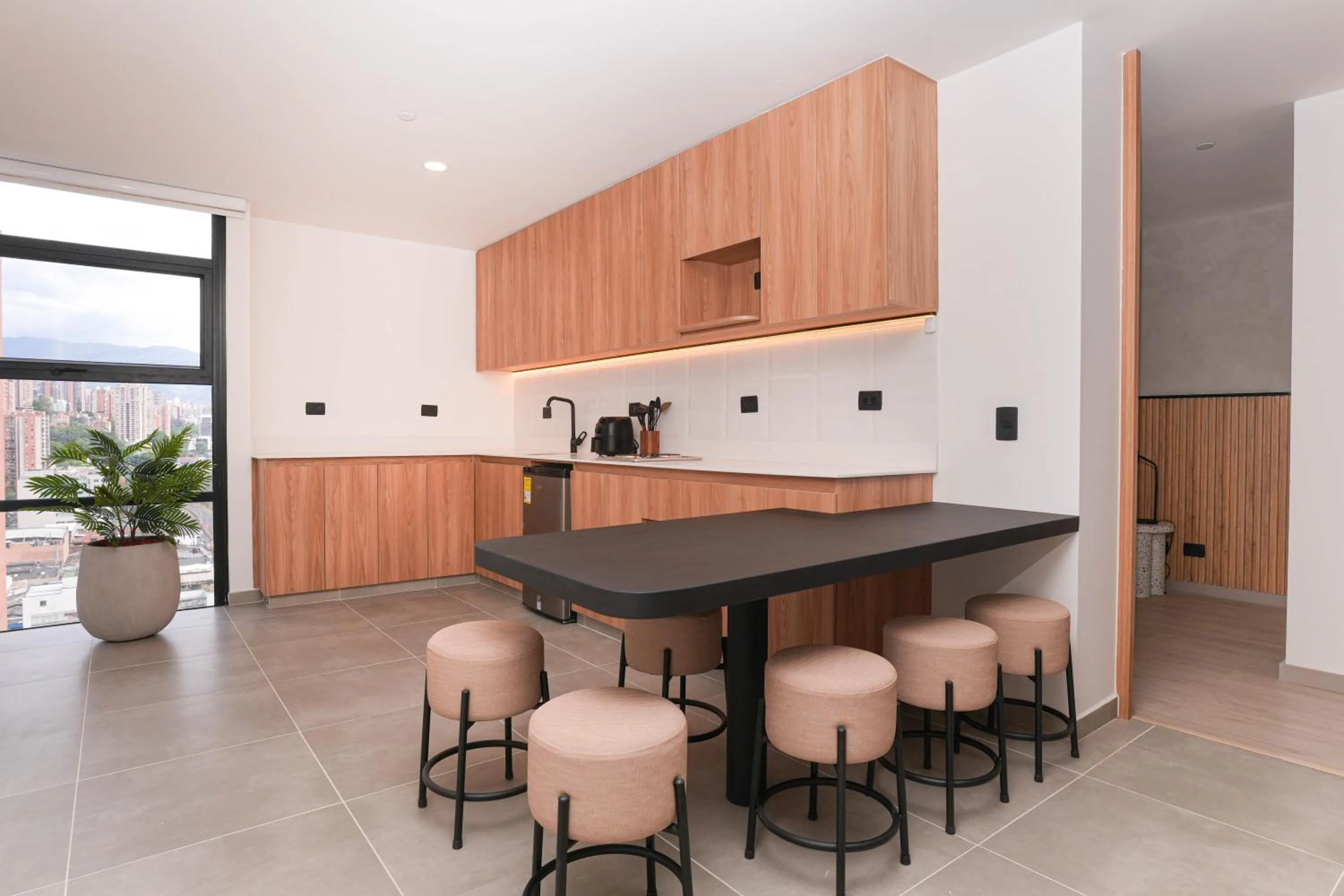 Kitchen or kitchenette in Metropolitan Living Medellín by HOUSY
