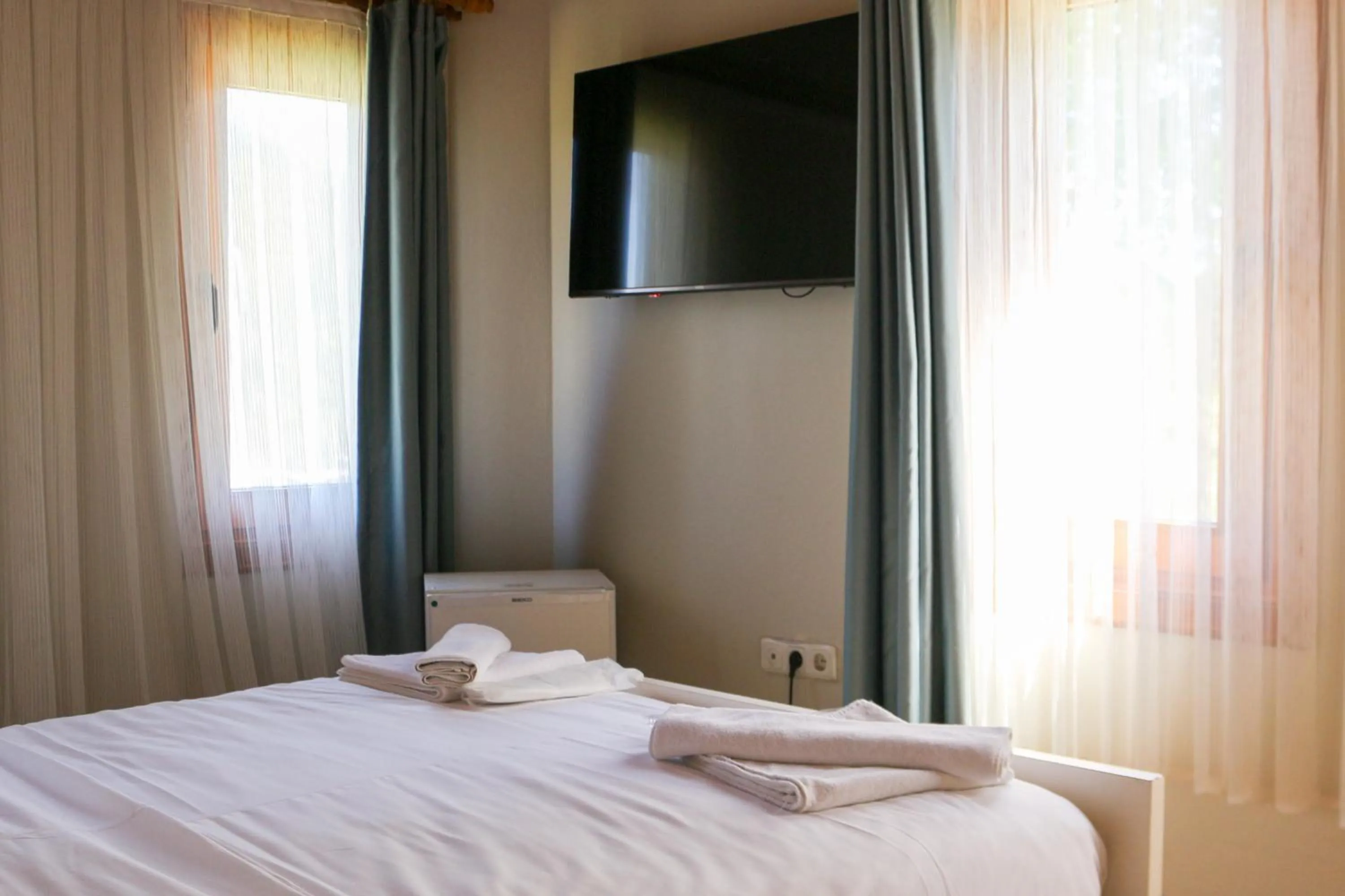 TV and multimedia, Bed in Mints Hotel Ağva