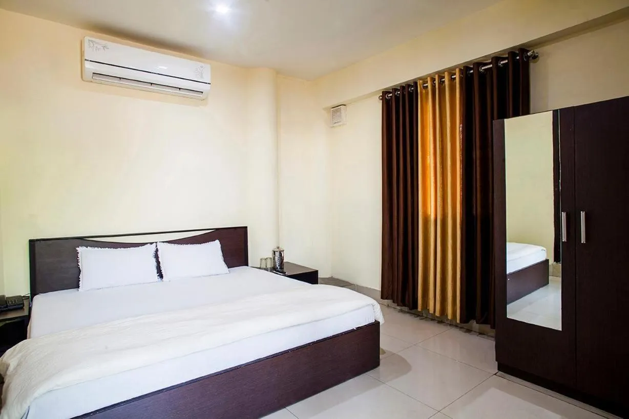 Bed in Hotel Sunshine