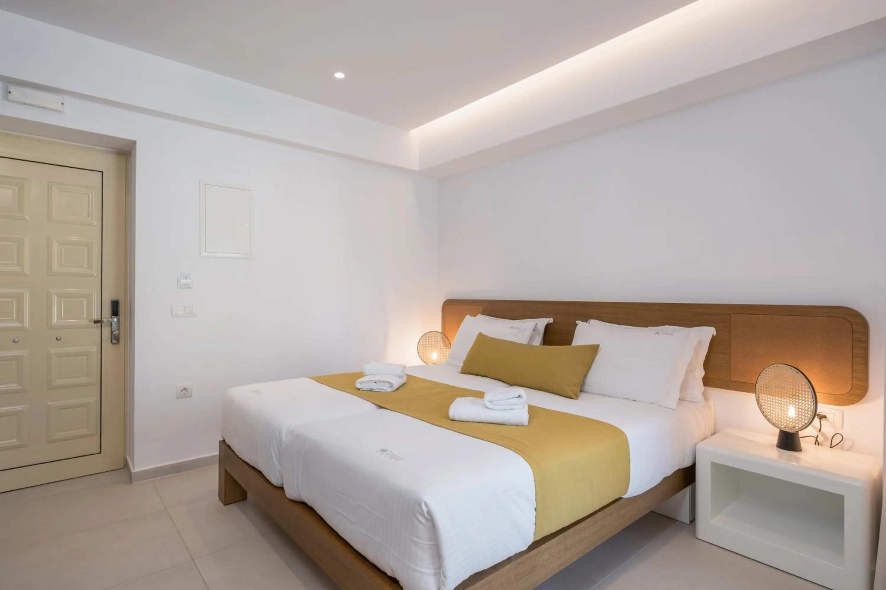 Bed in Tarra Seaside Hotel