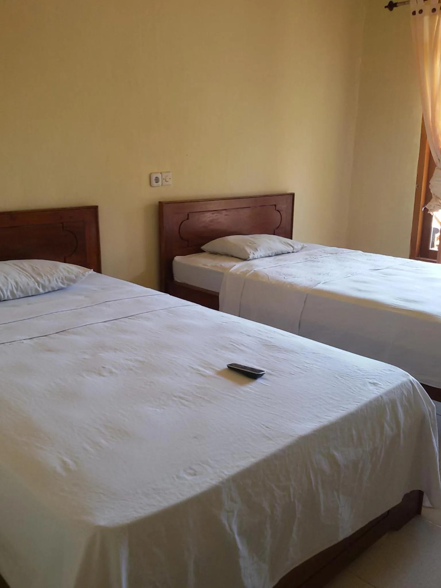 Photo of the whole room, Bed in Syifa Homestay