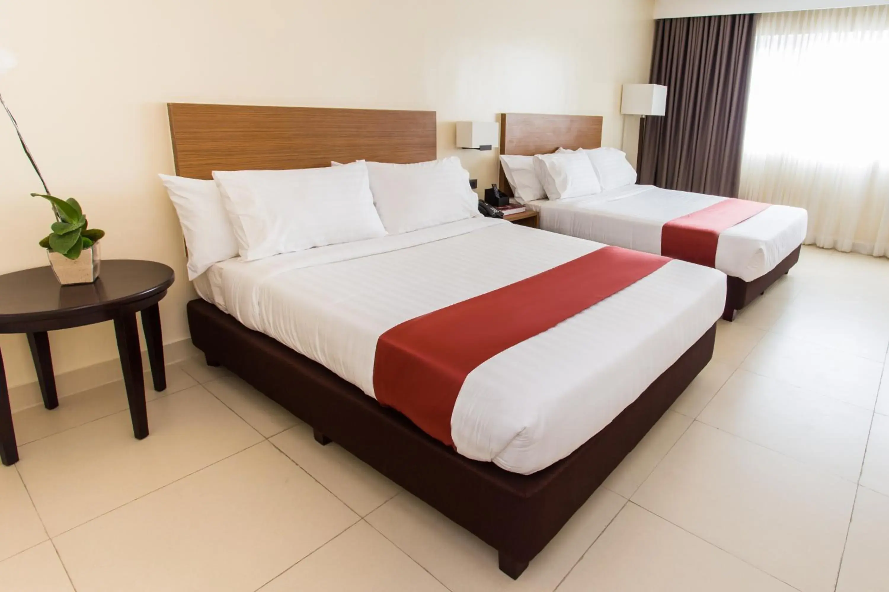 Photo of the whole room, Bed in Royce Hotel & Casino Photo of the whole room, Bed in Royce Hotel & Casino