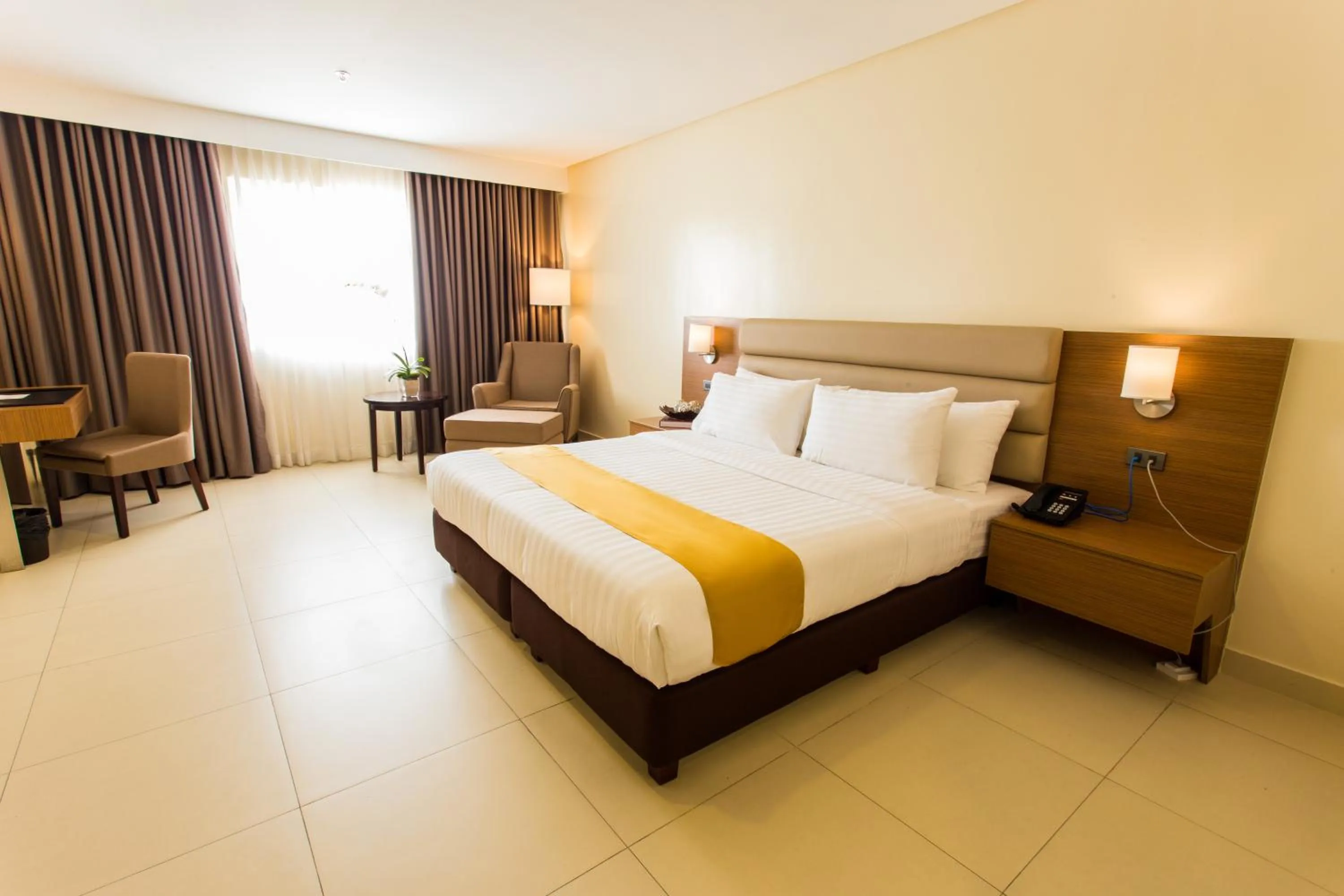 Photo of the whole room, Bed in Royce Hotel & Casino