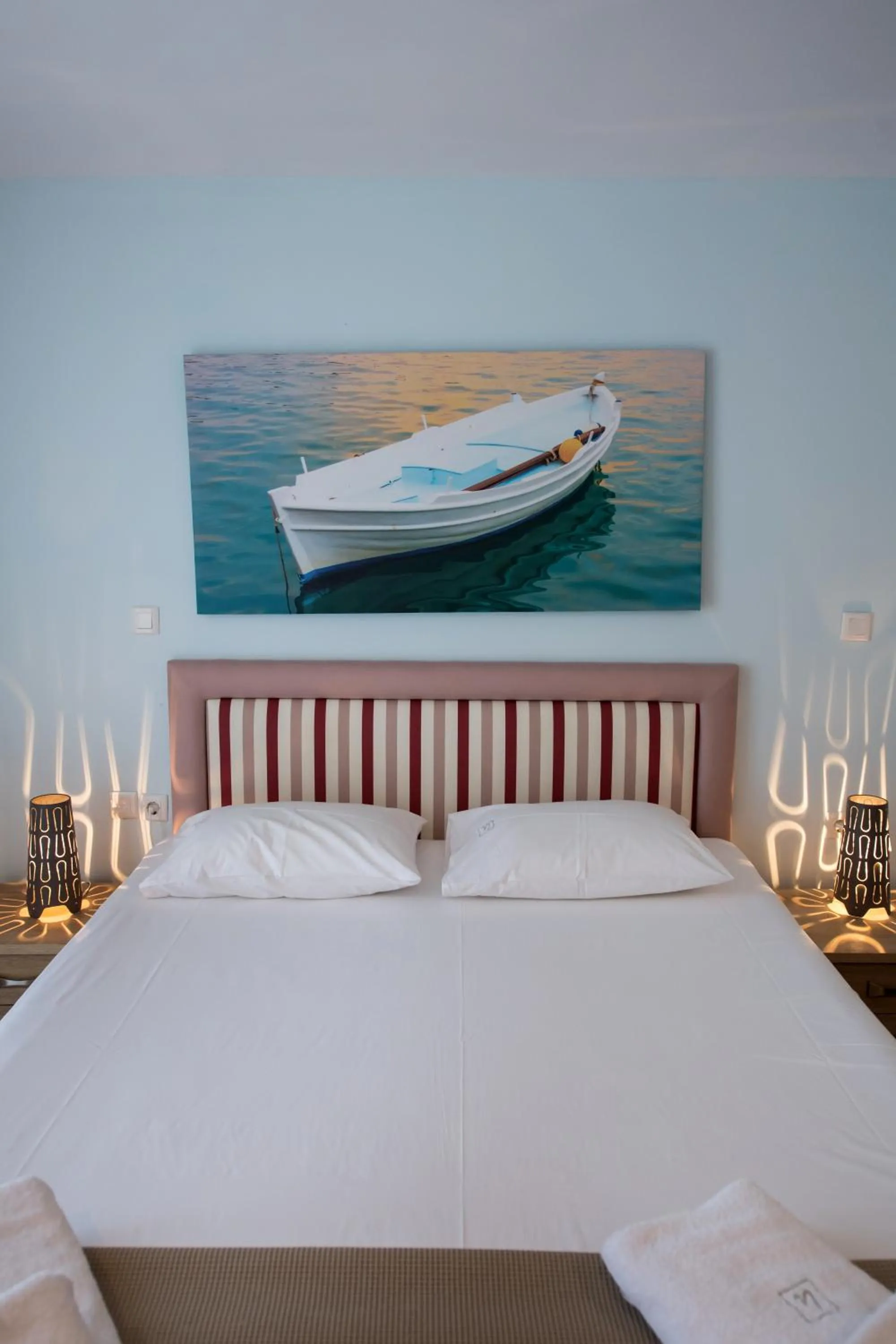 Bed in Ilianthos Apartments & Rooms