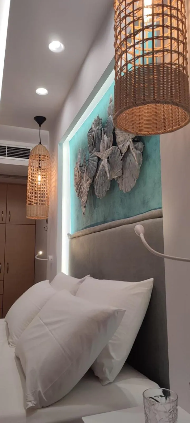 Bed in Ilianthos Apartments & Rooms