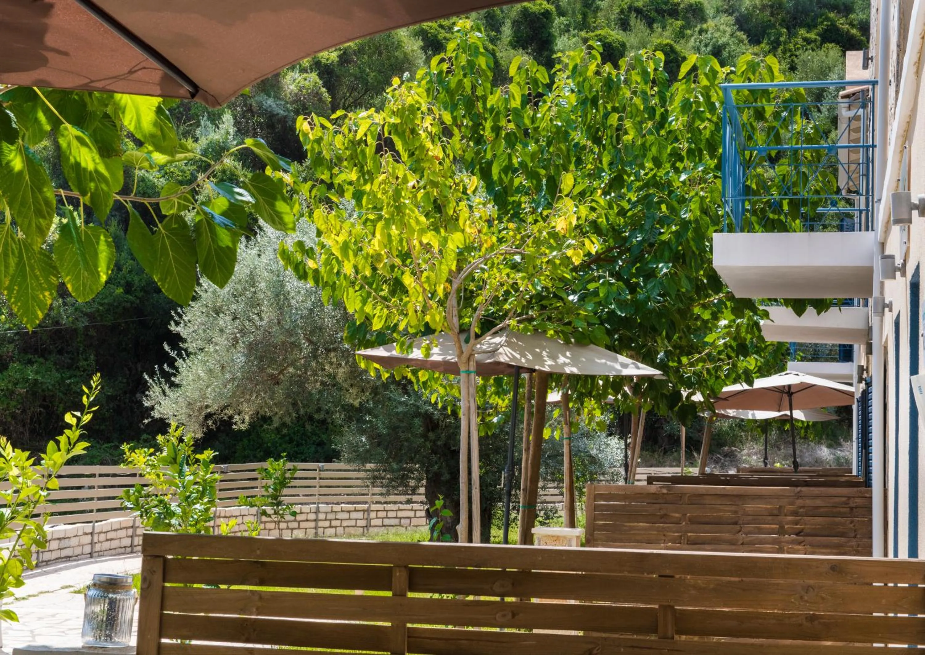 Patio in Ilianthos Apartments & Rooms