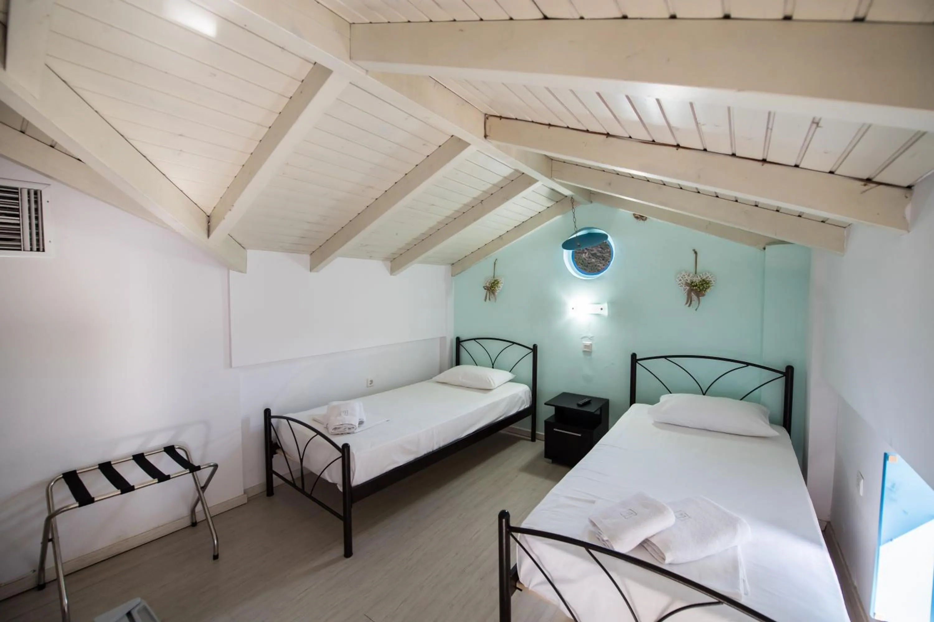 Bed in Ilianthos Apartments & Rooms