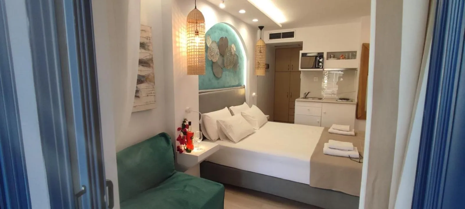 Bed in Ilianthos Apartments & Rooms