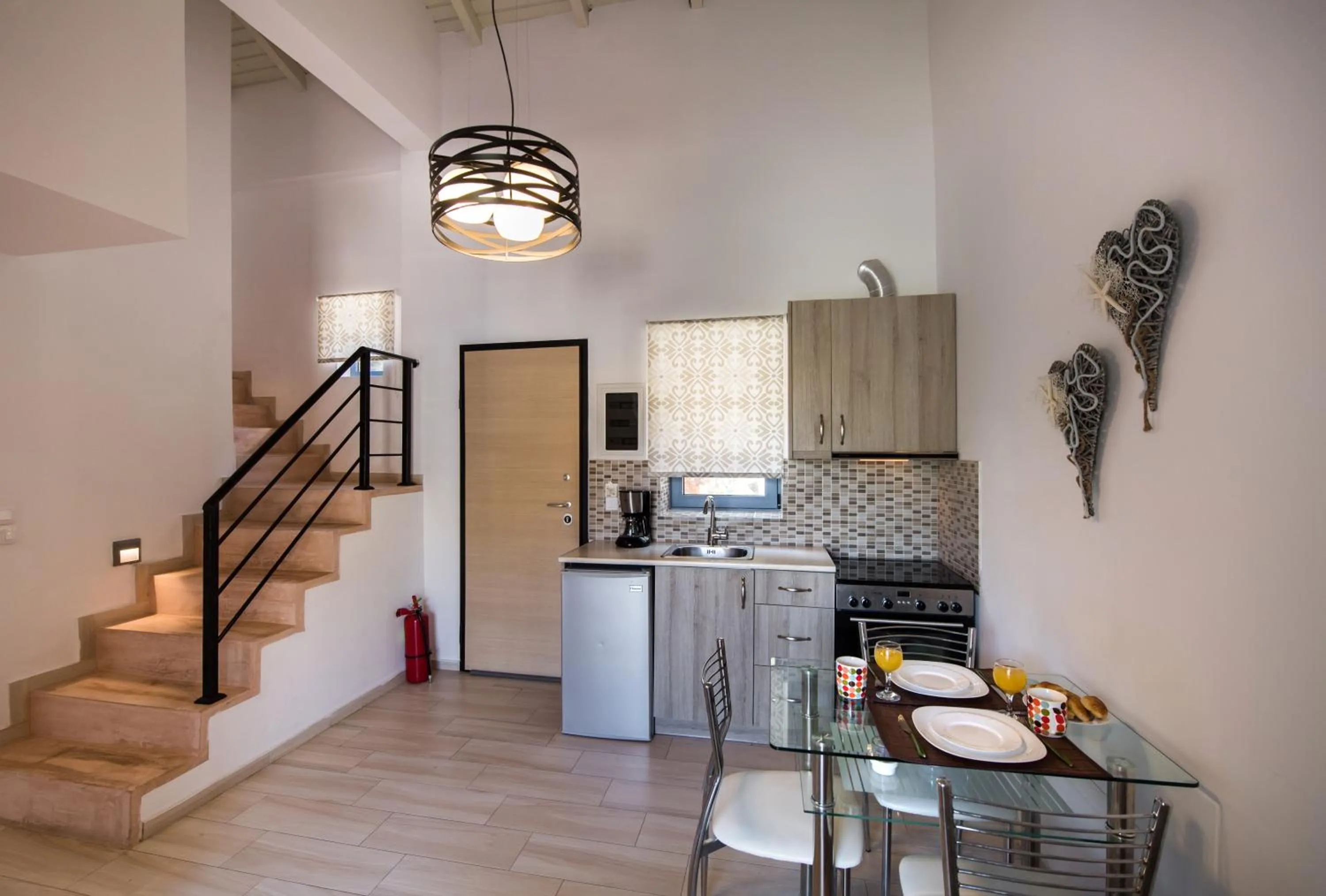 Kitchen or kitchenette in Ilianthos Apartments & Rooms