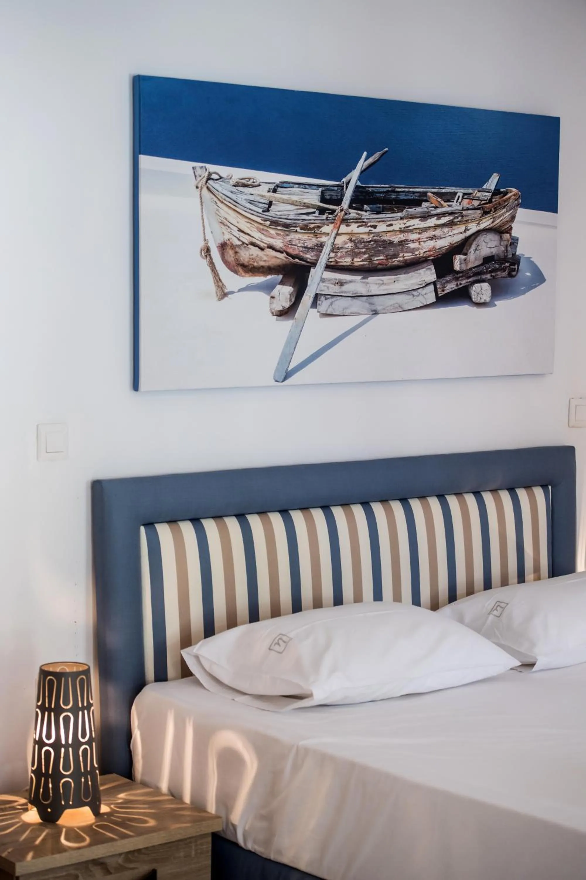 Bed in Ilianthos Apartments & Rooms