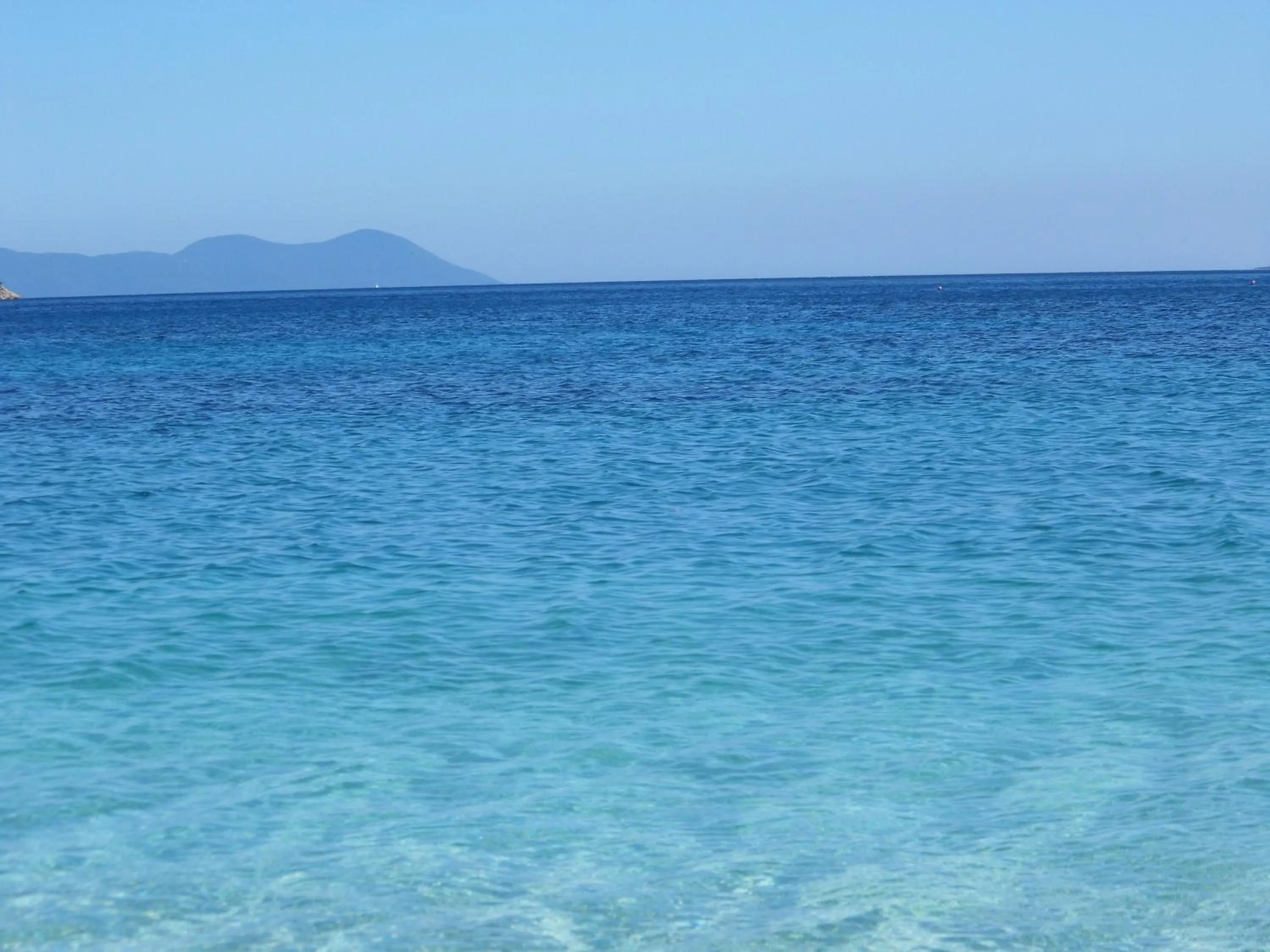 Beach in Ilianthos Apartments & Rooms