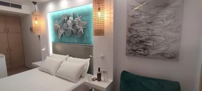 Bed in Ilianthos Apartments & Rooms