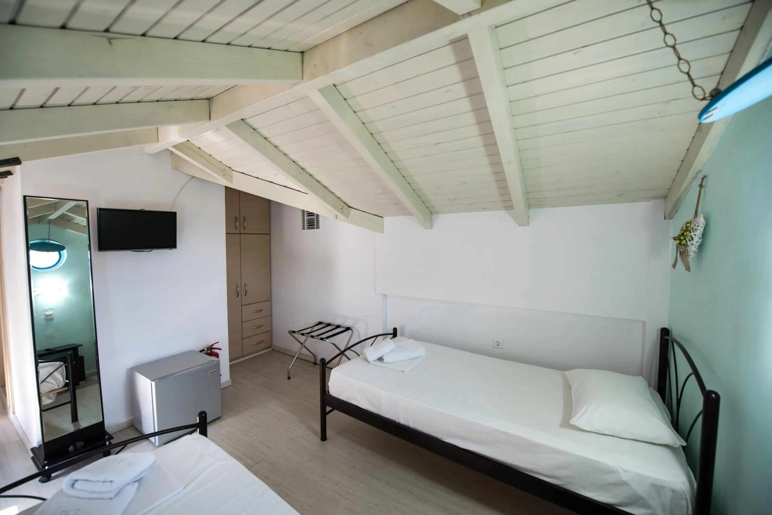 Bed in Ilianthos Apartments & Rooms