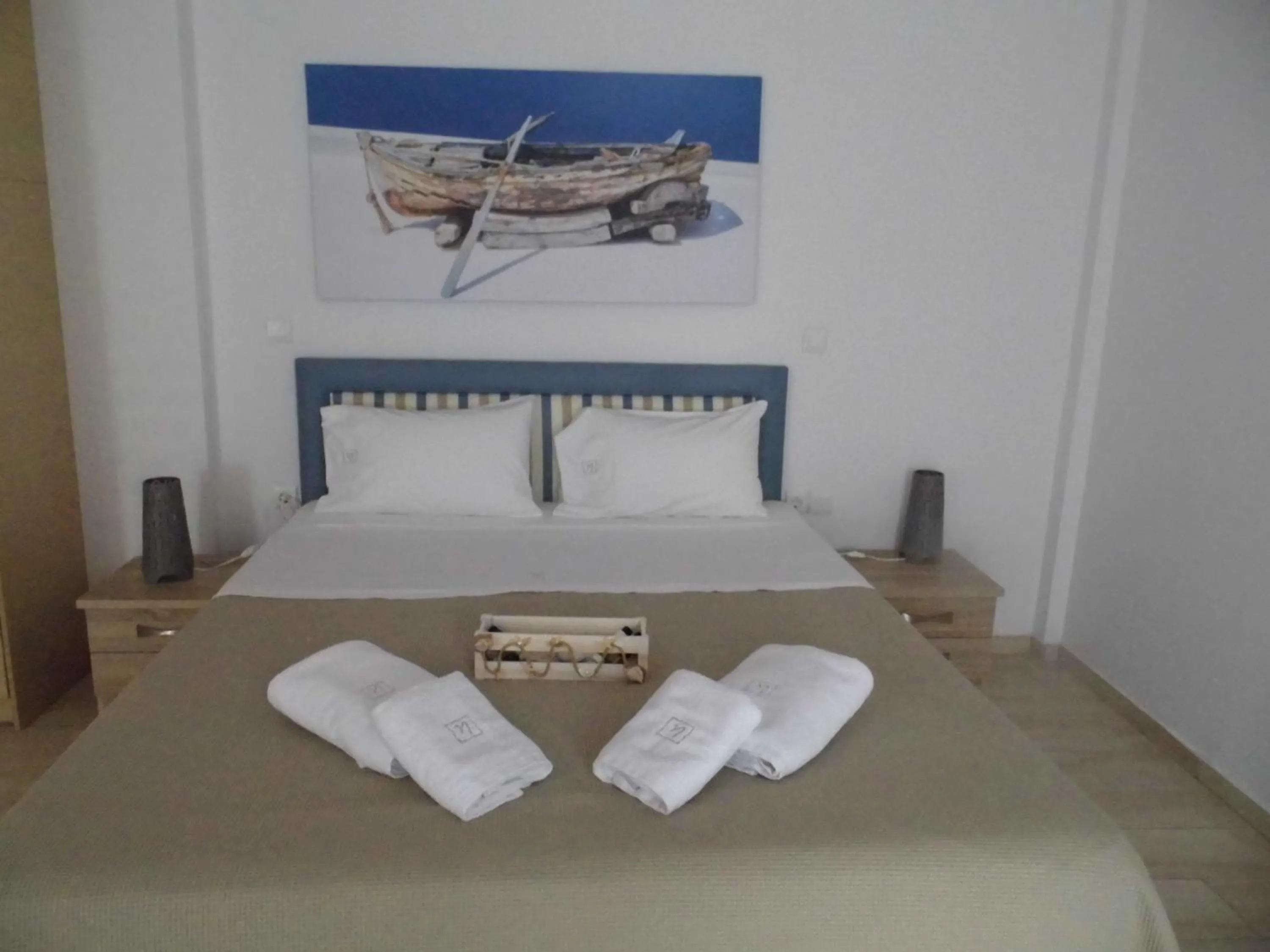 Bed in Ilianthos Apartments & Rooms
