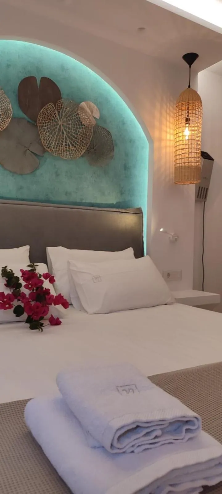 Bed in Ilianthos Apartments & Rooms