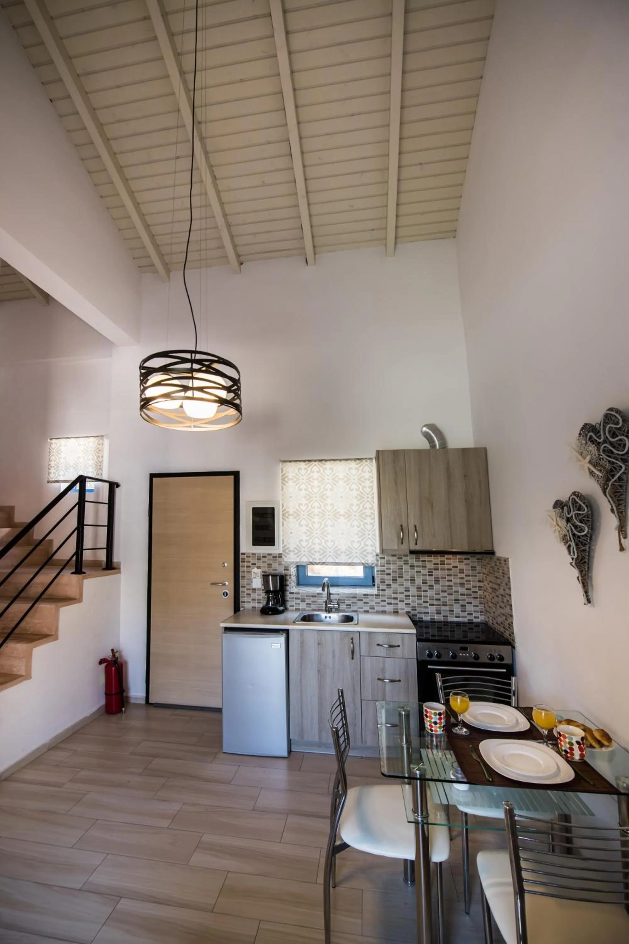 Kitchen or kitchenette in Ilianthos Apartments & Rooms