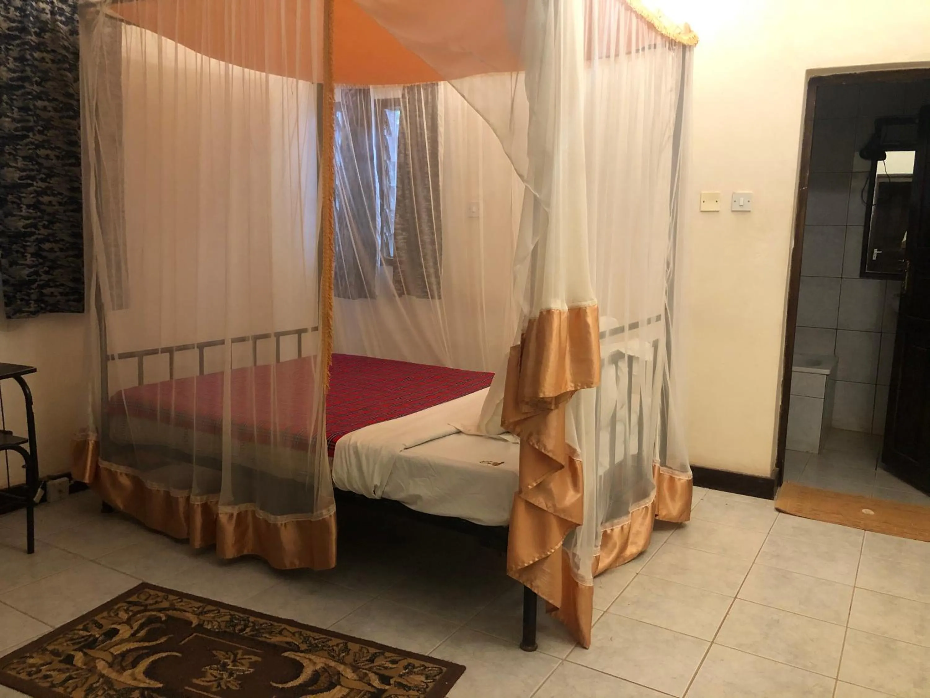 Bed in Impala Safari Lodge