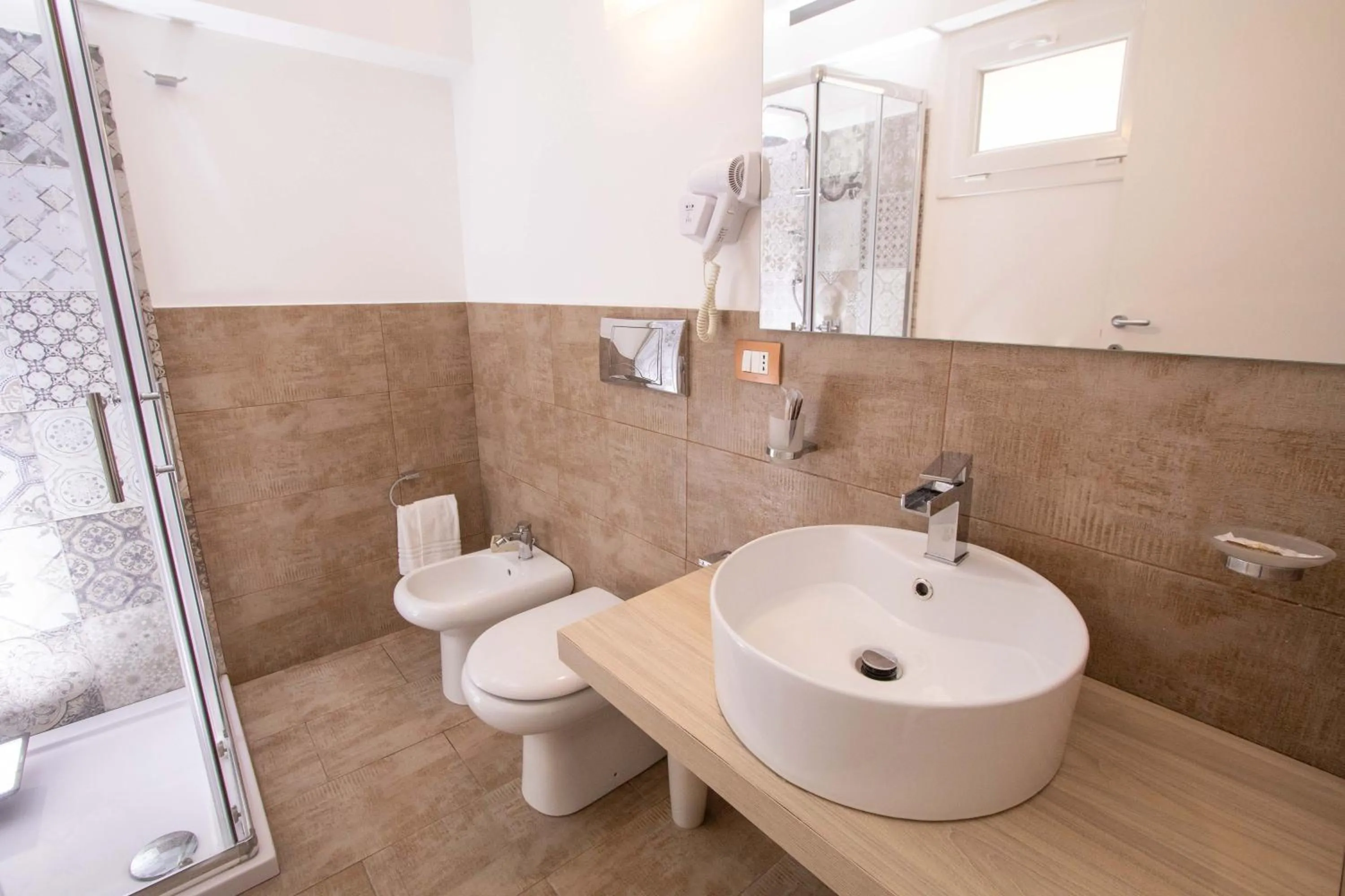 Bathroom in Le Torrette Rooms and Apartments