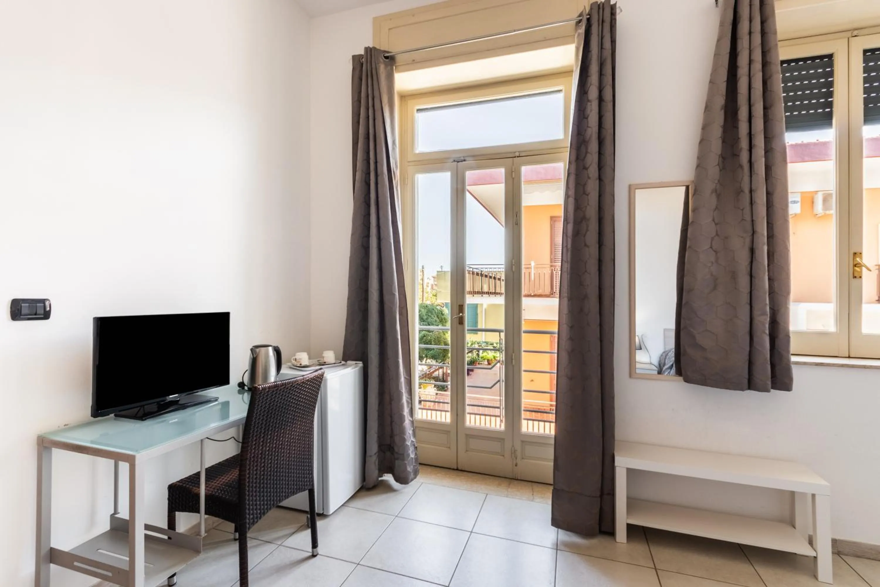 Bedroom in Le Torrette Rooms and Apartments