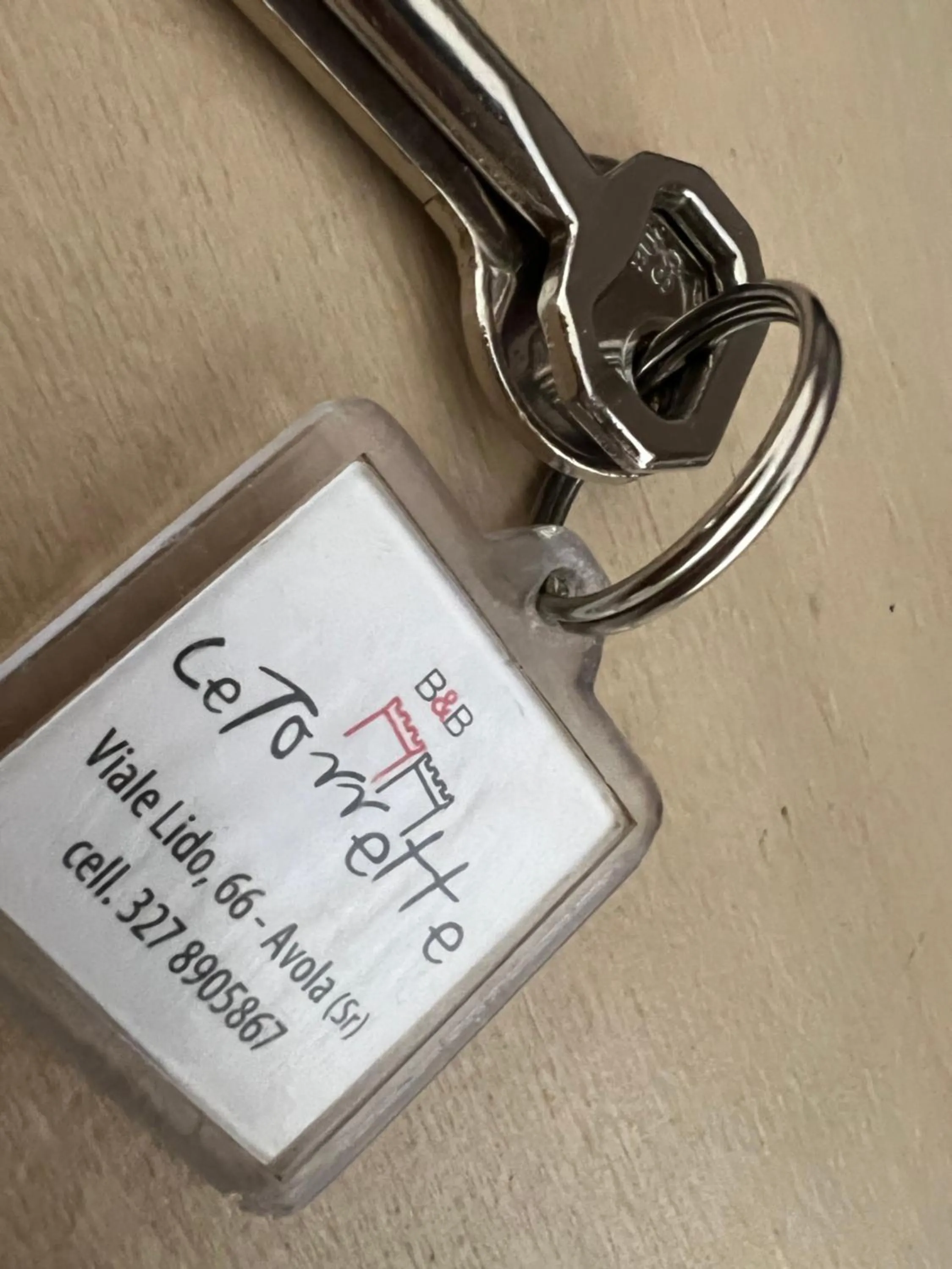 Text overlay in Le Torrette Rooms and Apartments