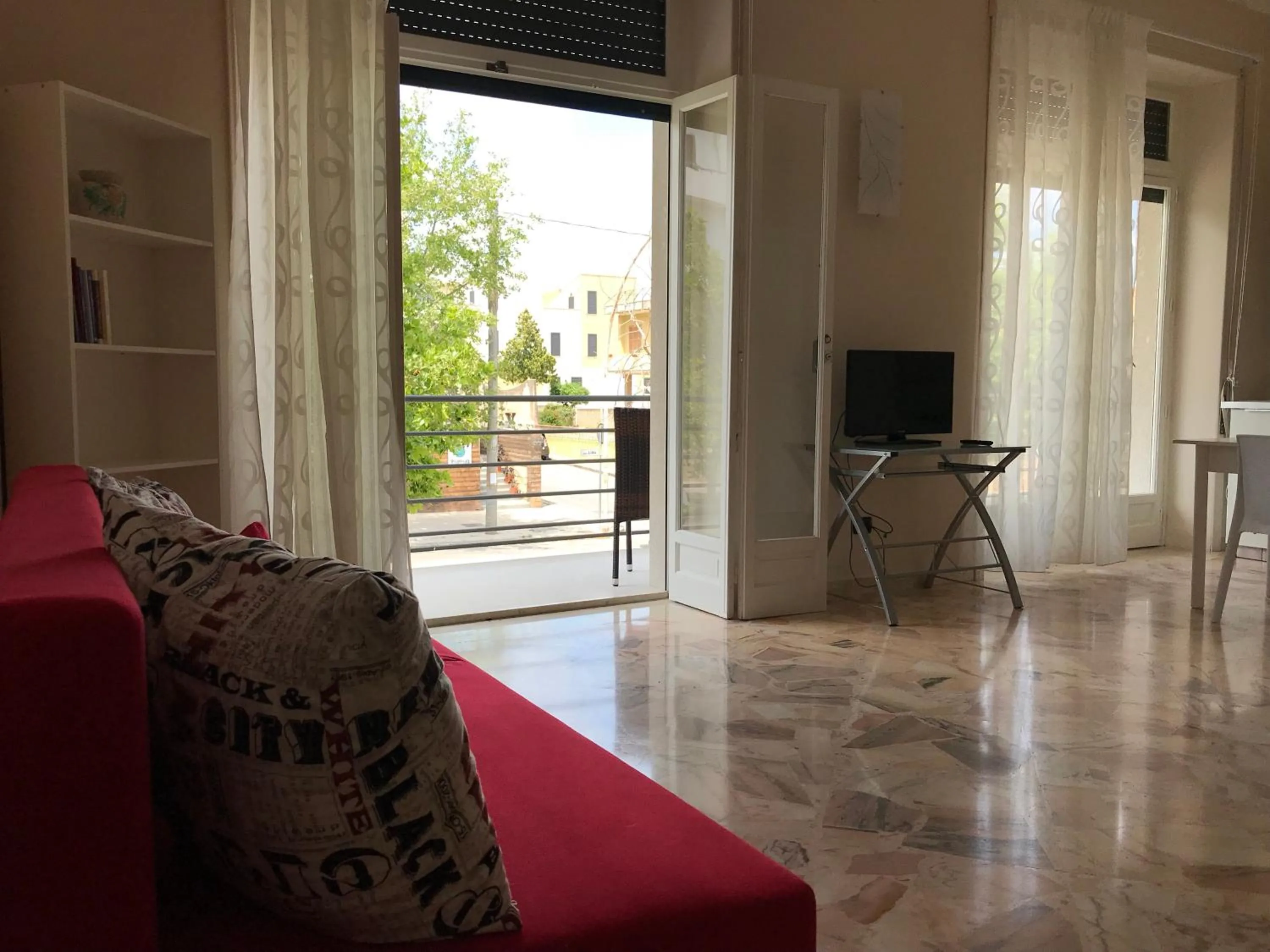 Garden in Le Torrette Rooms and Apartments
