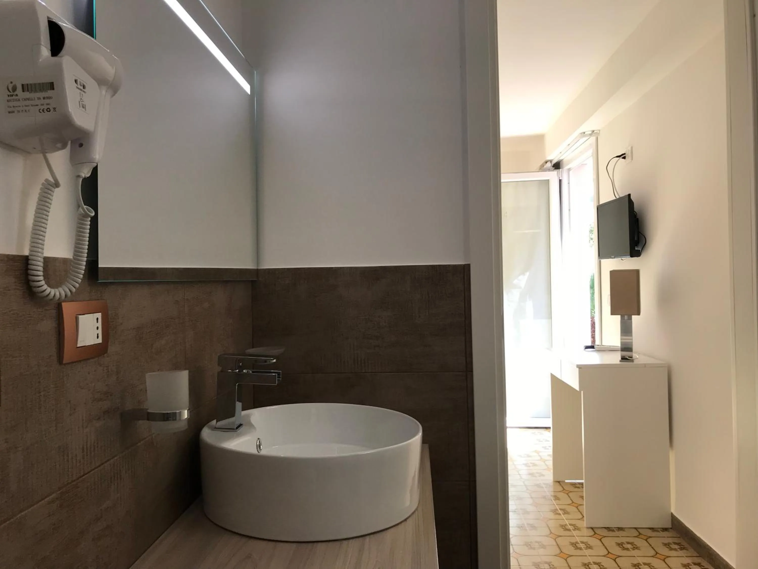 Bathroom in Le Torrette Rooms and Apartments