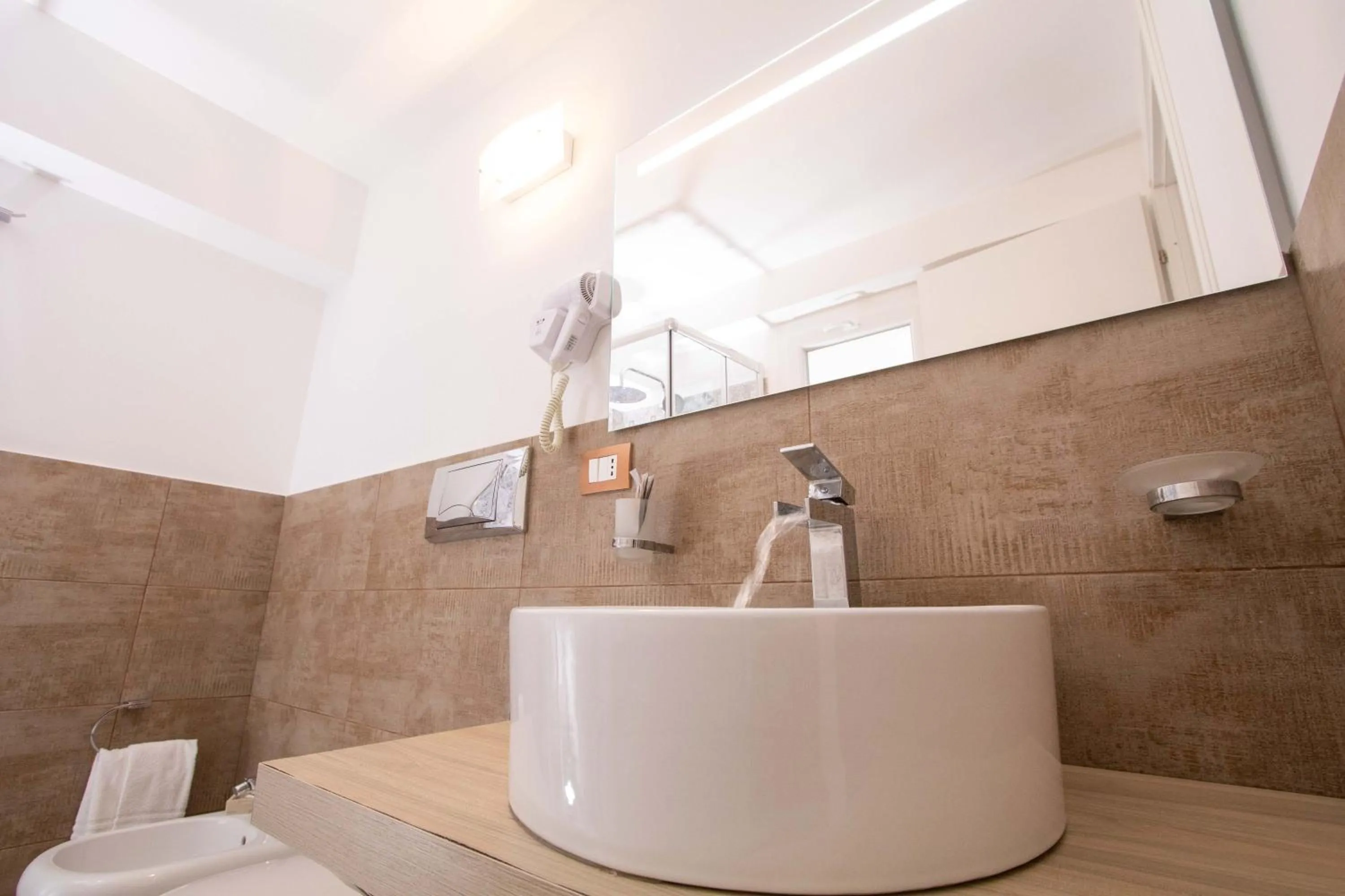 Bathroom in Le Torrette Rooms and Apartments